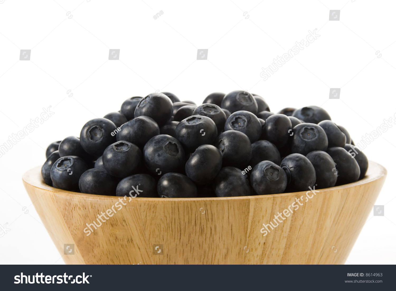 mix of blueberries blackberries raspberries in wooden