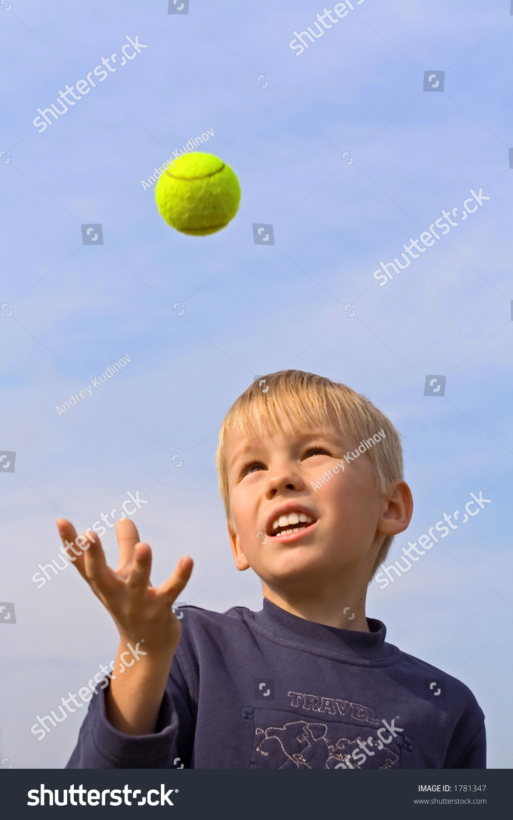 Boy Catching Tennis Ball Stock Photo 1781347 Shutterstock