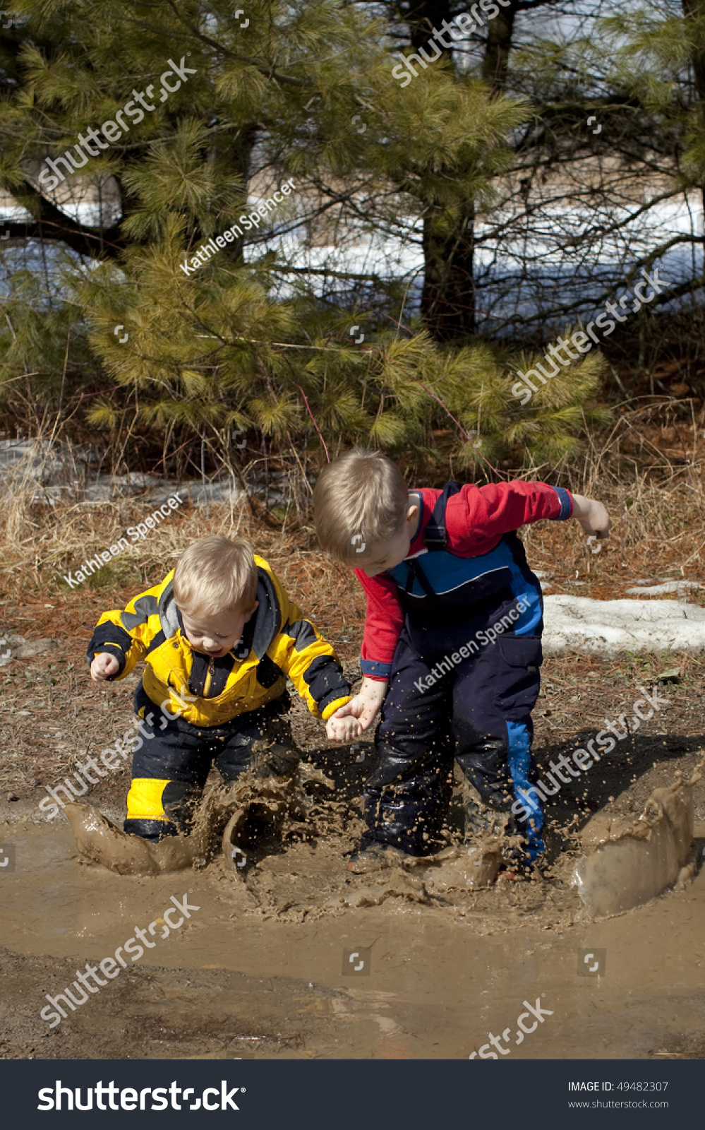 Boys Playing Splashing Mud Puddle Stock Photo 49482307 Shutterstock