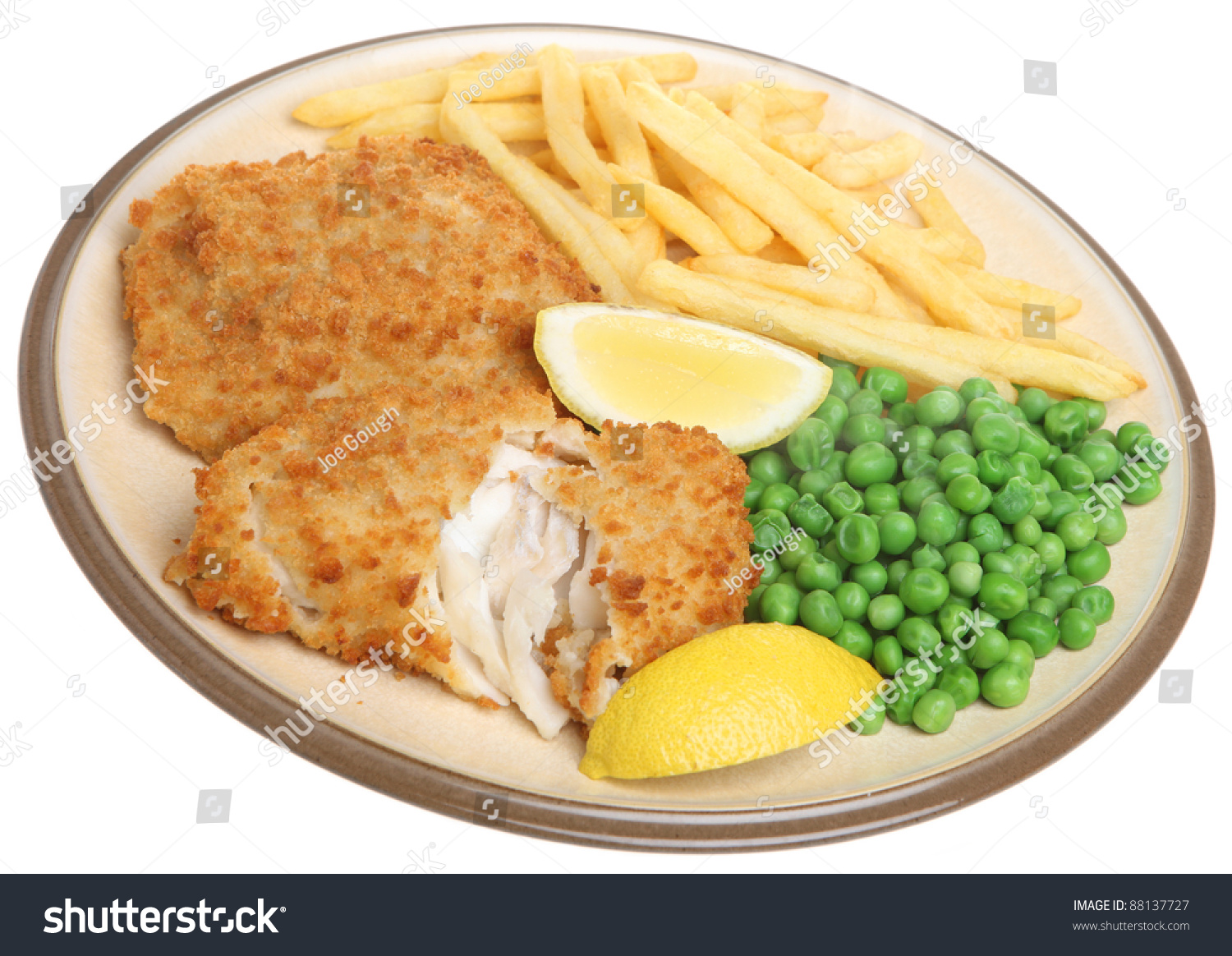 Breaded Haddock Fillets With Fries And Peas Stock Photo 88137727