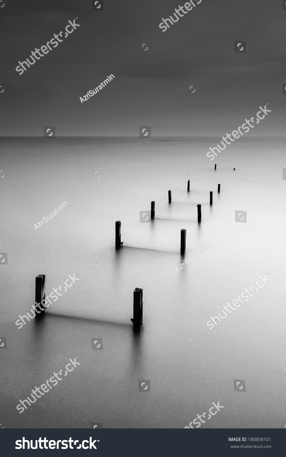 Broken jetty in slow-shutter vignette black and white Broken jetty in slow-shutter vignette black and white