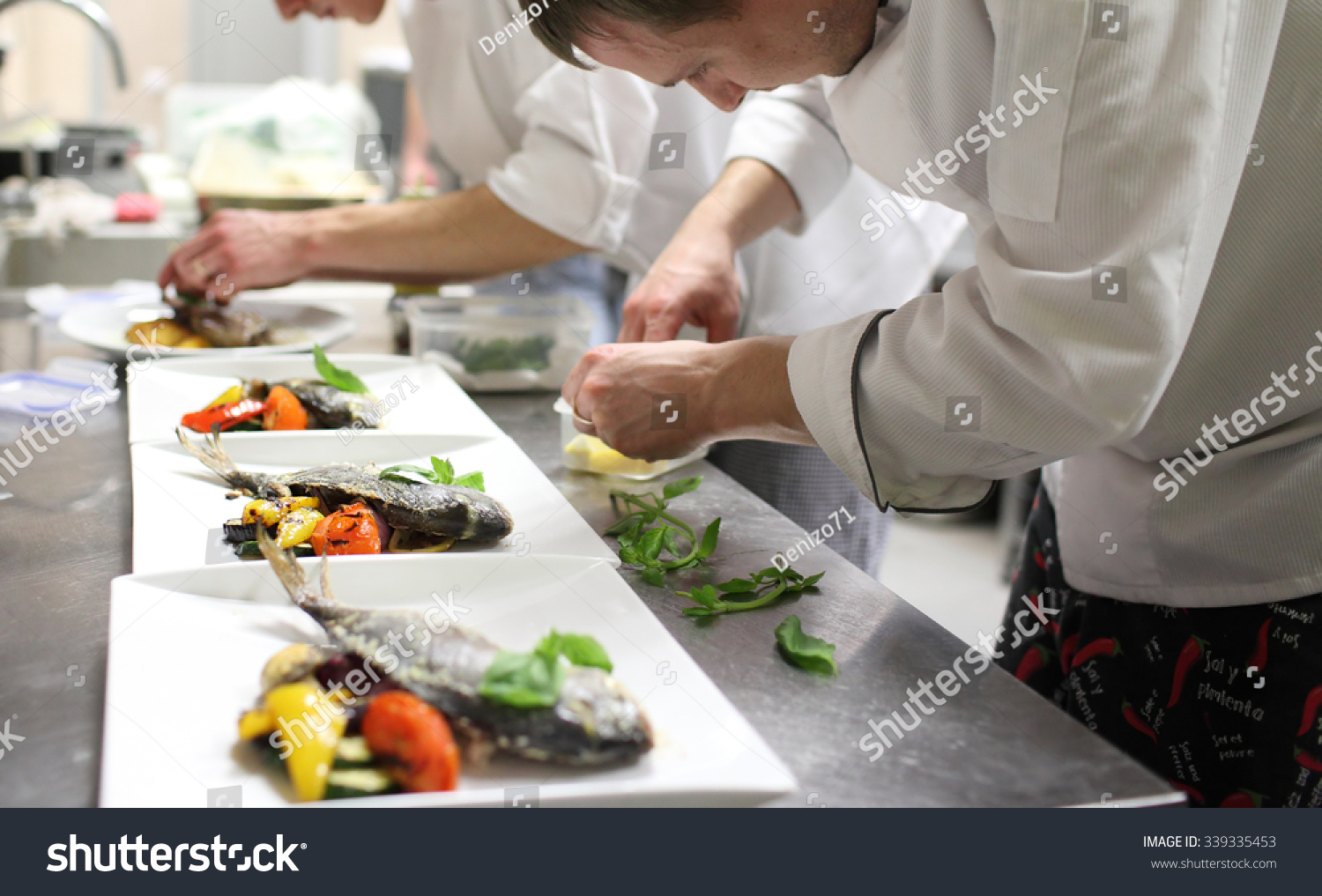 Busy Chefs At Work In The Restaurant Kitchen Stock Photo 339335453 ...