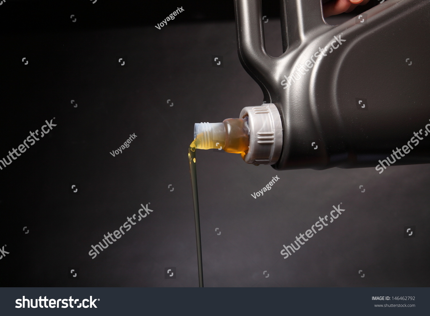 http://image.shutterstock.com/z/stock-photo-can-with-car-engine-oil-pouring-in-front-black-background-146462792.jpg