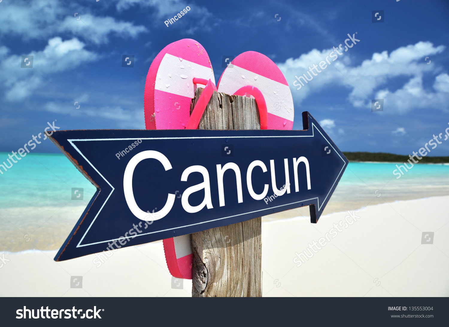 Cancun sign beach