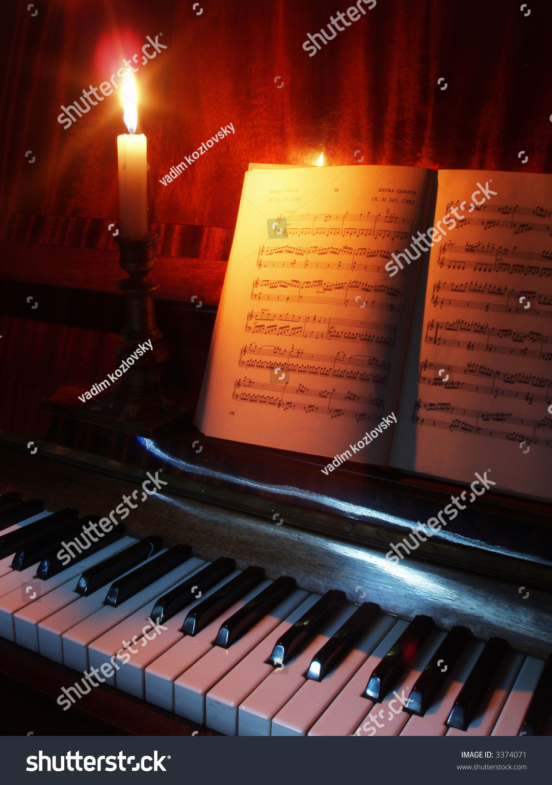 Candle And Sheet Music On The Piano Stock Photo 3374071 Shutterstock