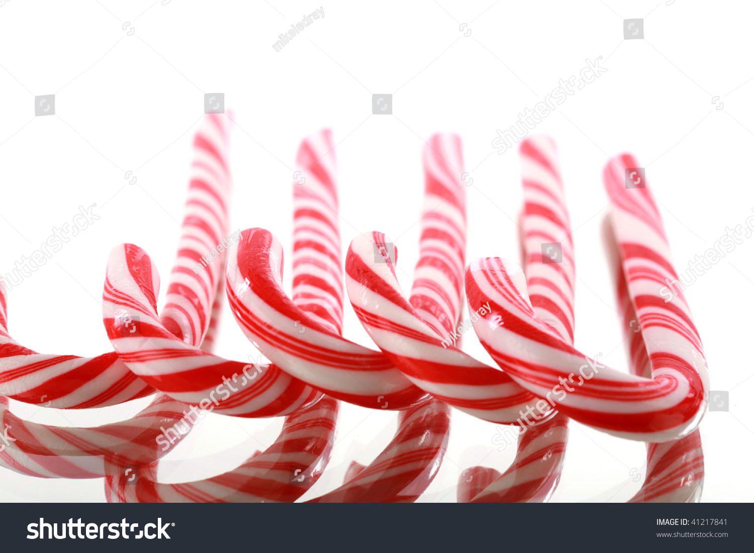 Canes On A Mirror Isolated On White Canes On A Mirror Isolated On White Stock Photo