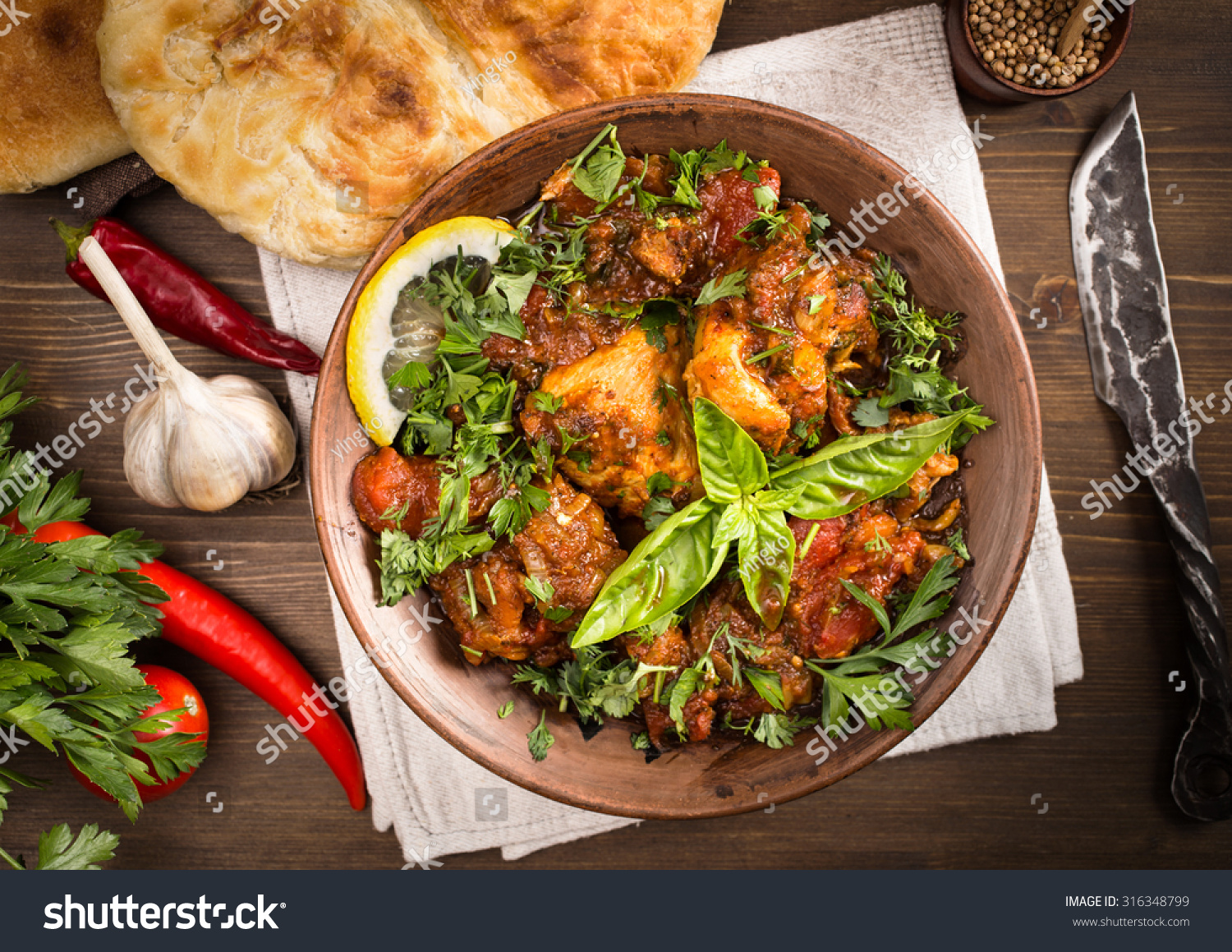 Chakhokhbili - Traditional Georgian Dish. Chicken Stewed With Tomatoes ...