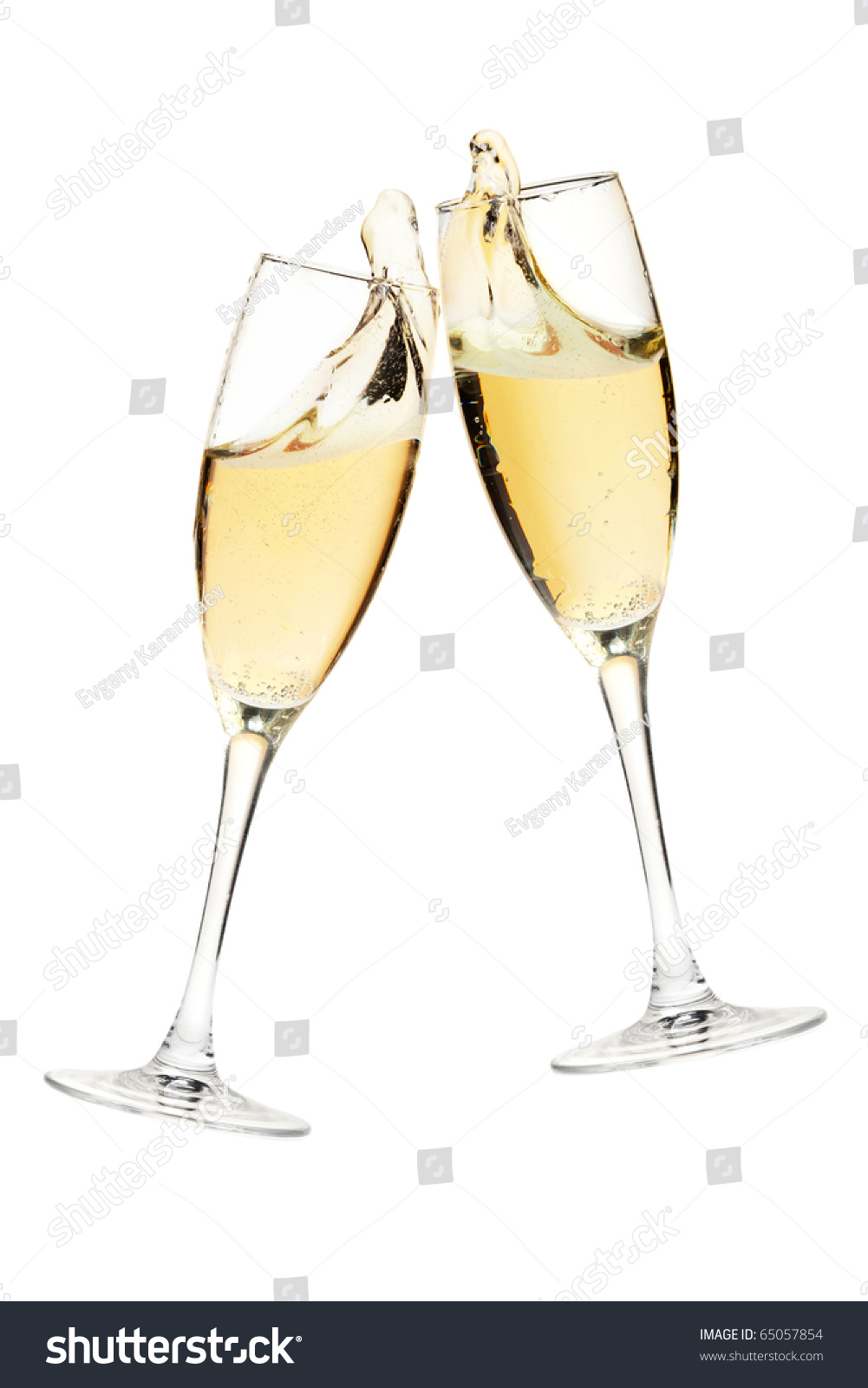 http://image.shutterstock.com/z/stock-photo-cheers-two-champagne-glasses-isolated-on-white-65057854.jpg