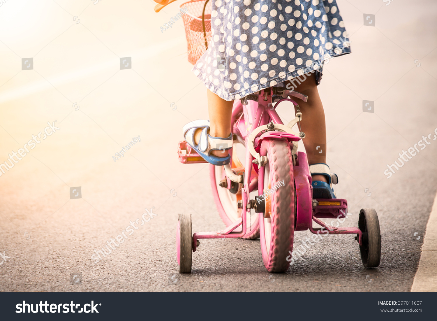 little girl riding bike