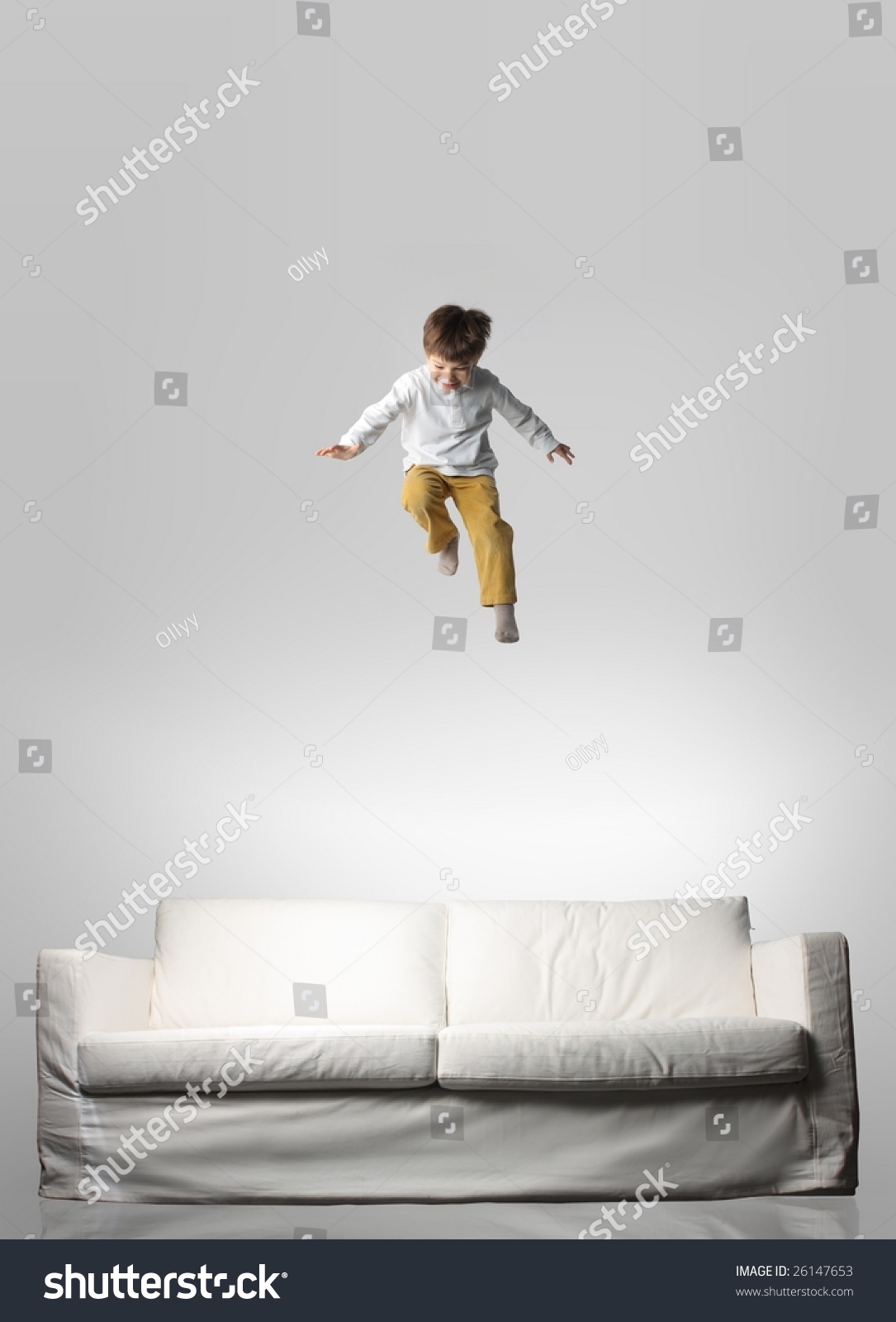 Child Jumping On A Sofa Stock Photo 26147653 Shutterstock