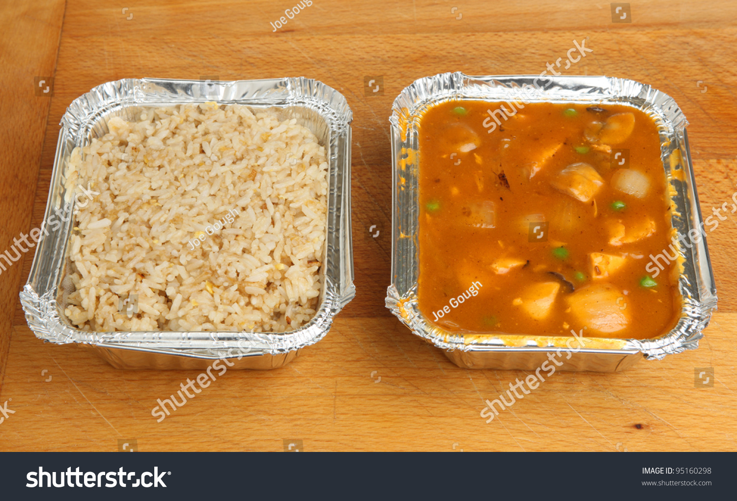 Chinese Chicken Curry And Egg Fried Rice Takeaway Meal Stock Photo chinese-chicken-curry-and-egg-fried-rice-takeaway-meal-stock-photo