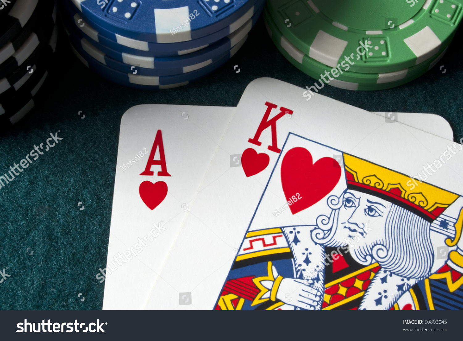 Chips And Ace King On A Table Chips And Ace King On A Table Stock Photo