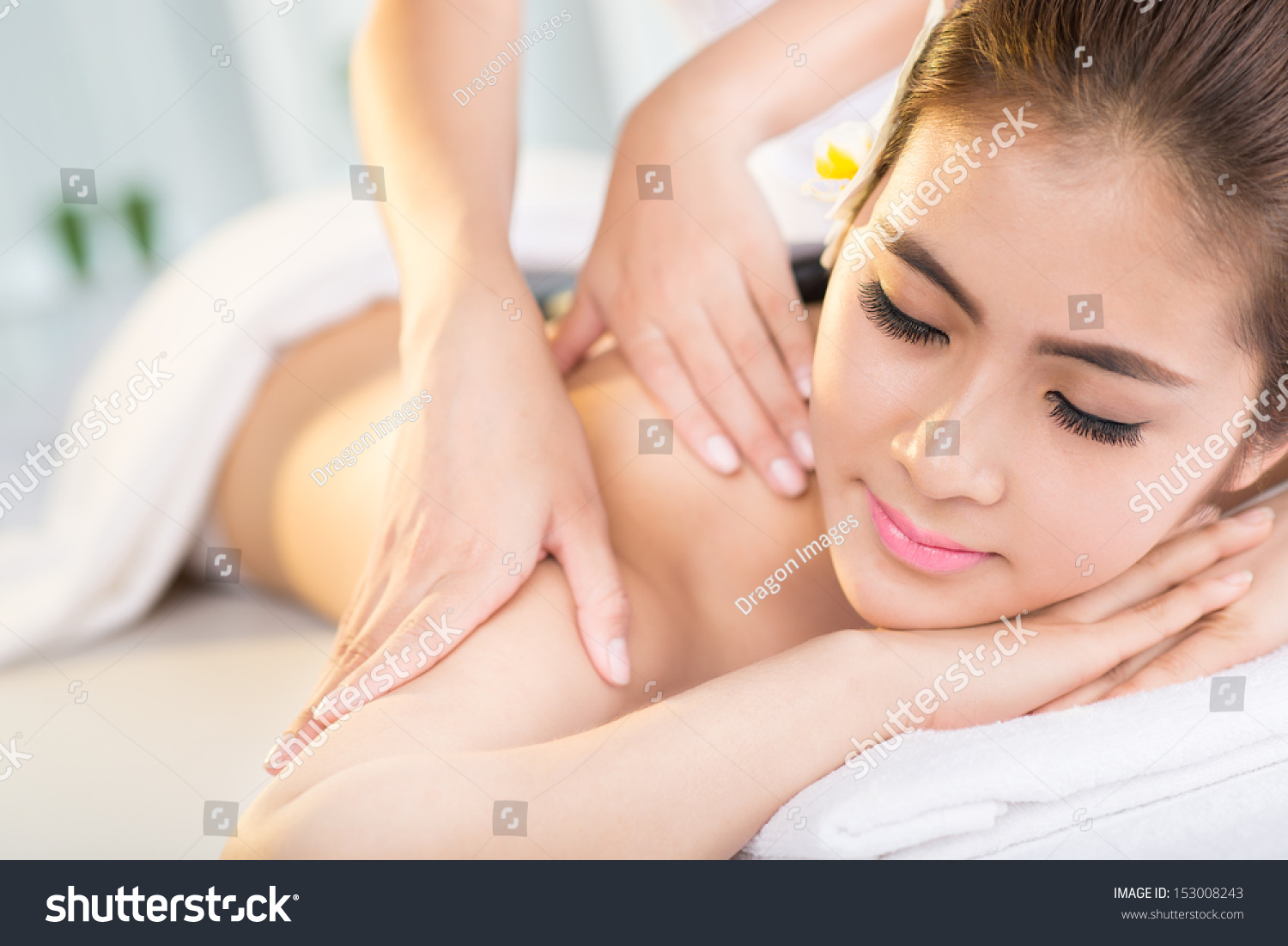 CloseUp Image Of A Beautiful Young Woman Having Spa Massage On The