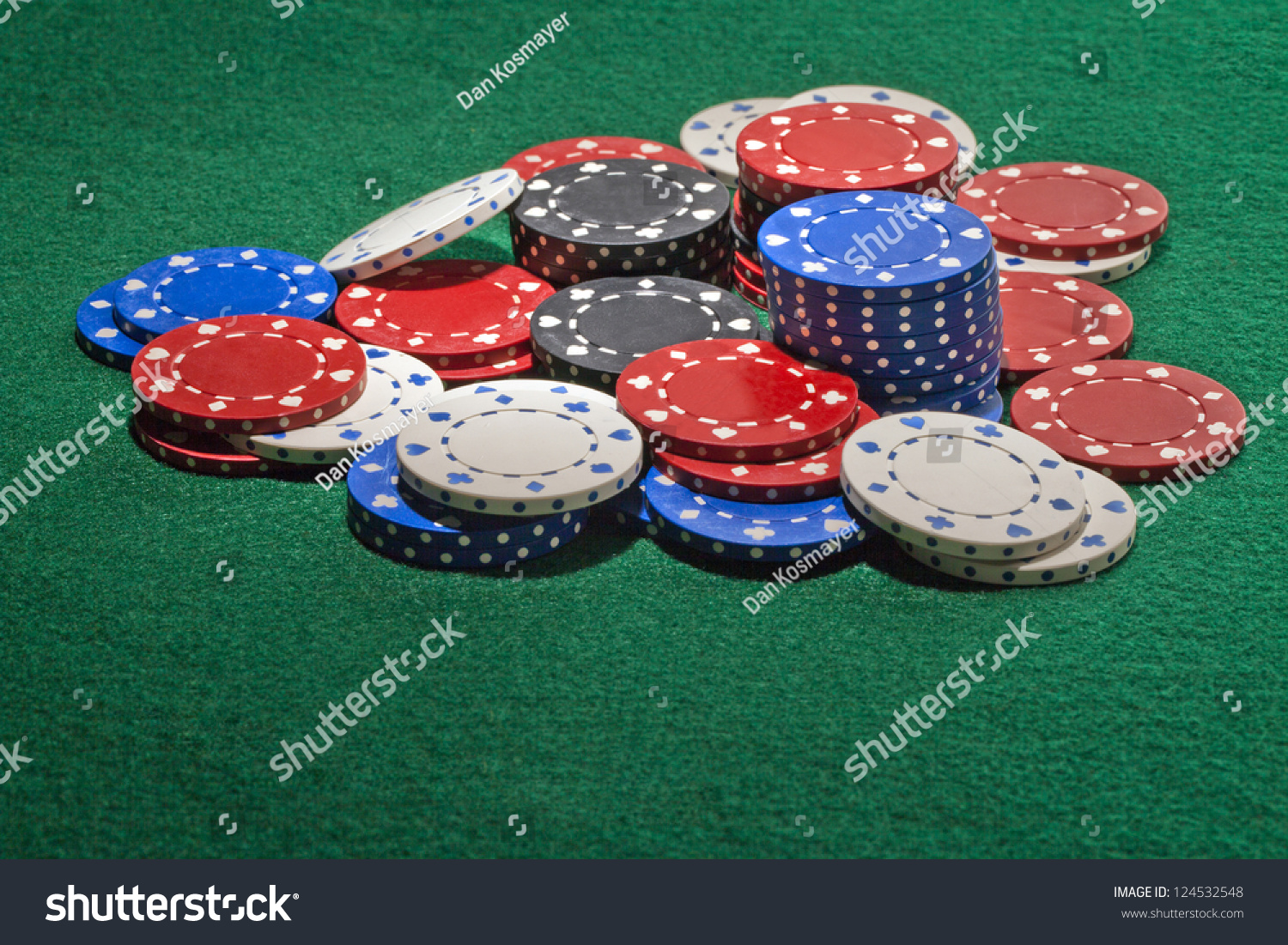 Casino Chips Up On The Table Up Image Of Colorful Casino Chips On The Green Table
