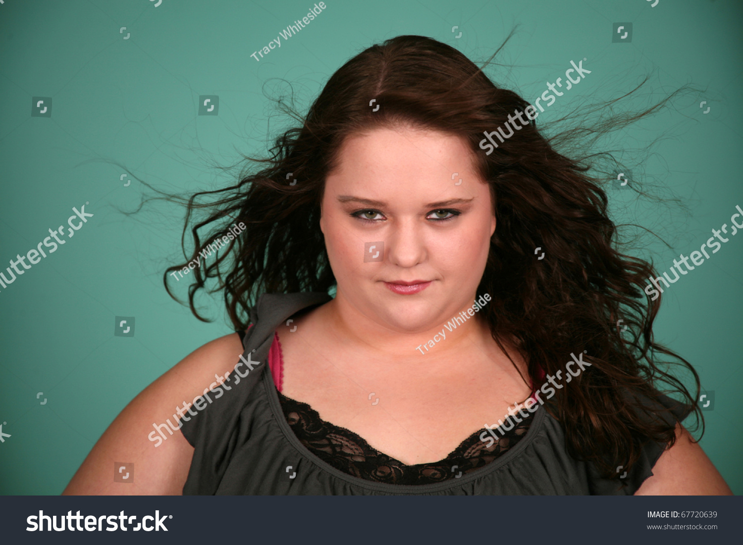 close-up-of-beautiful-plus-size-girl-stock-photo-67720639-shutterstock