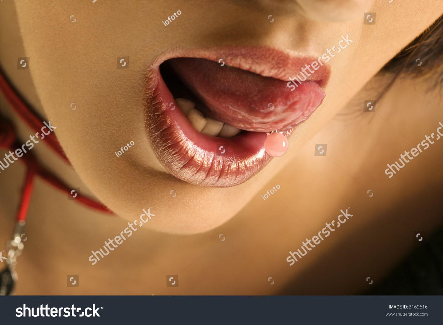 Close Up Portrait Of Young Caucasian Woman Licking Lips Stock Photo