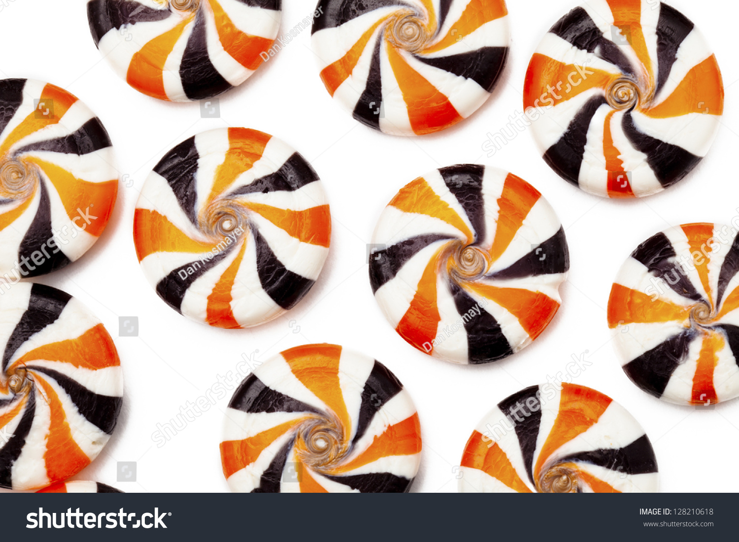 CloseUp Shot Of Colorful Hard Candies With Swirl Design Over White