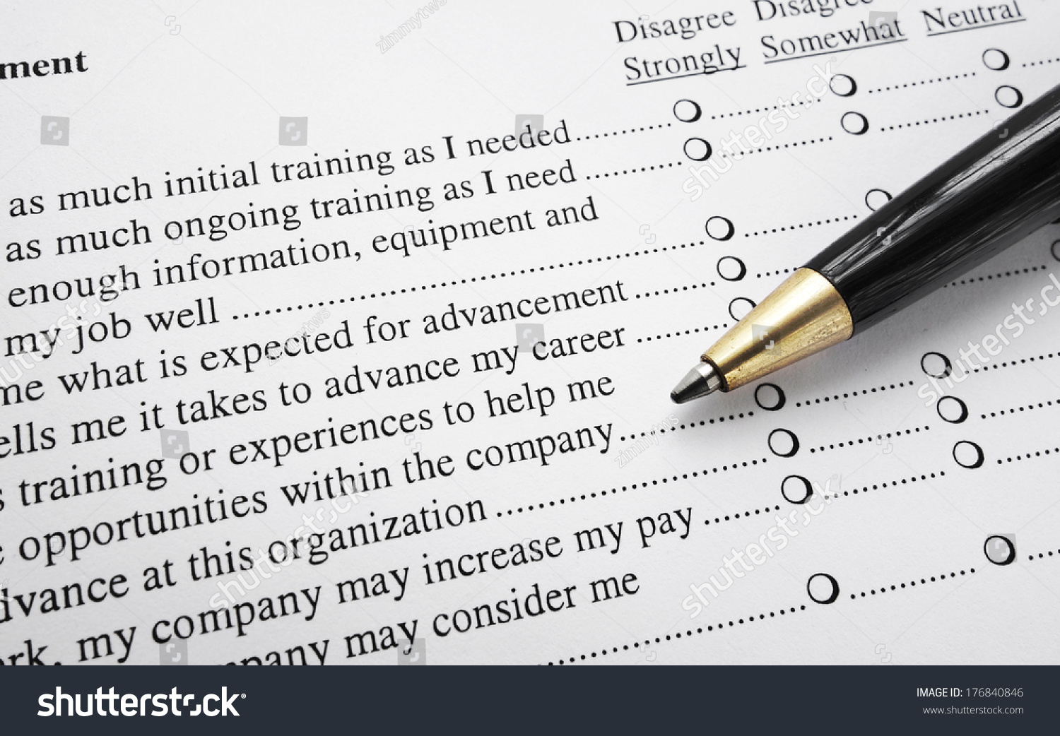 closeup-of-an-employee-survey-with-pen-stock-photo-176840846-shutterstock