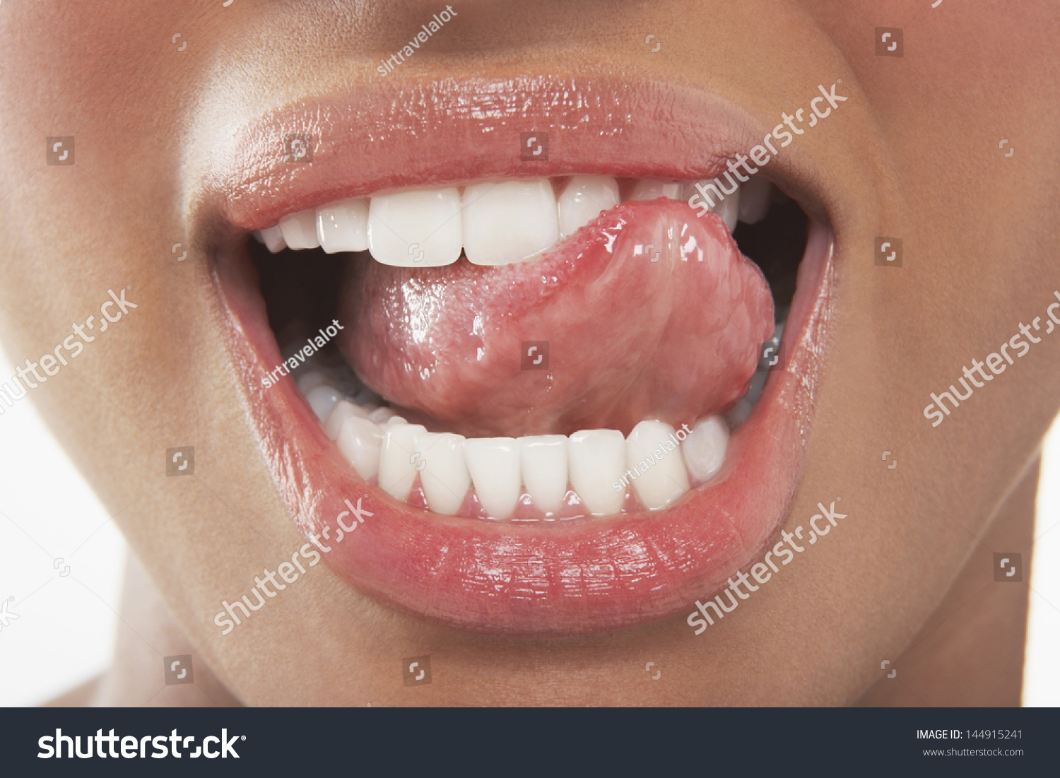 Closeup Of Woman Licking Her Teeth Stock Photo 144915241 Shutterstock