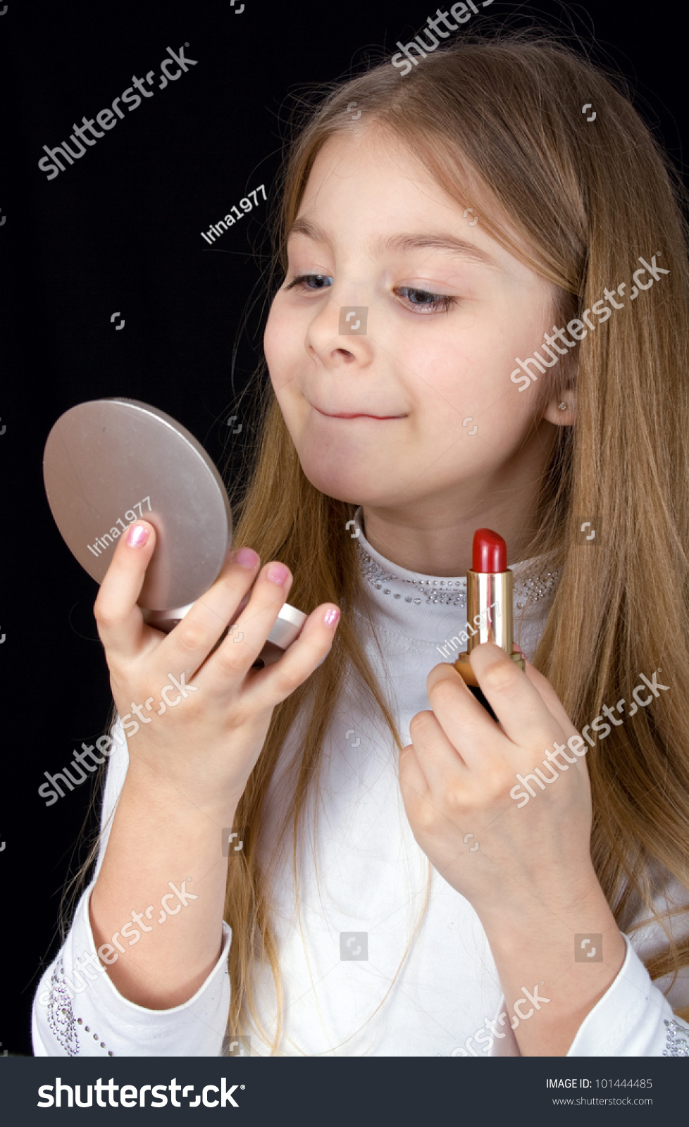 Closeup Portrait Of The Little Girl With Lipstick Stock Photo 101444485