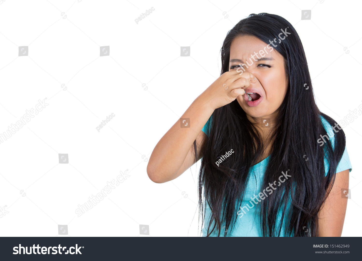 Closeup Portrait Young Woman, Disgust On Face, Pinches Nose Looks Funny 