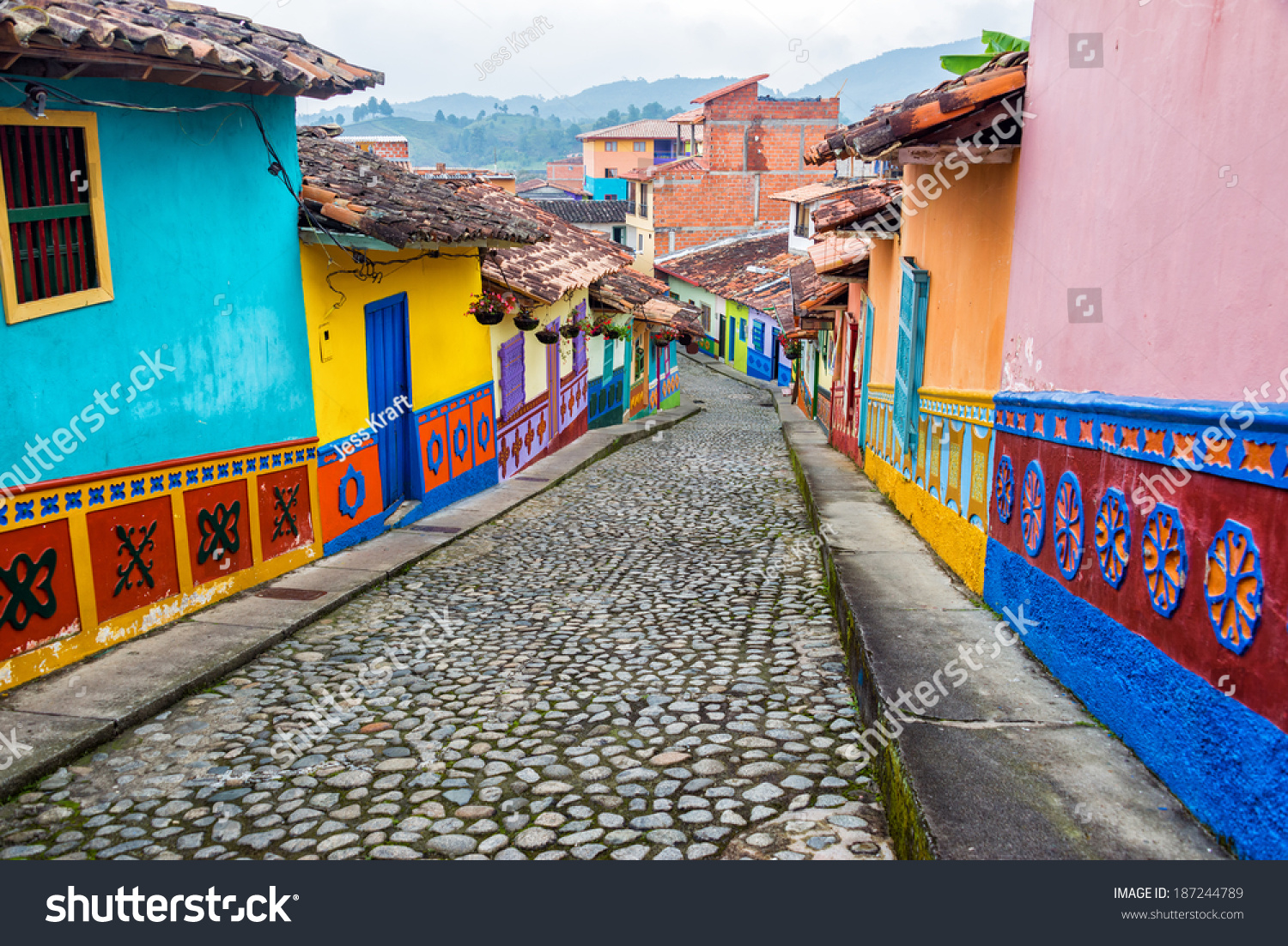 http://image.shutterstock.com/z/stock-photo-colorful-colonial-houses-on-a-cobblestone-street-in-guatape-antioquia-in-colombia-187244789.jpg