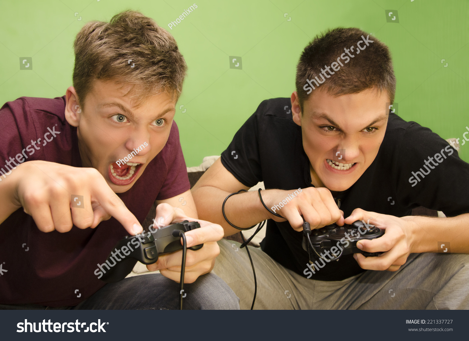 Competitive Brothers Playing Video Games Funny Stock Photo 22133772