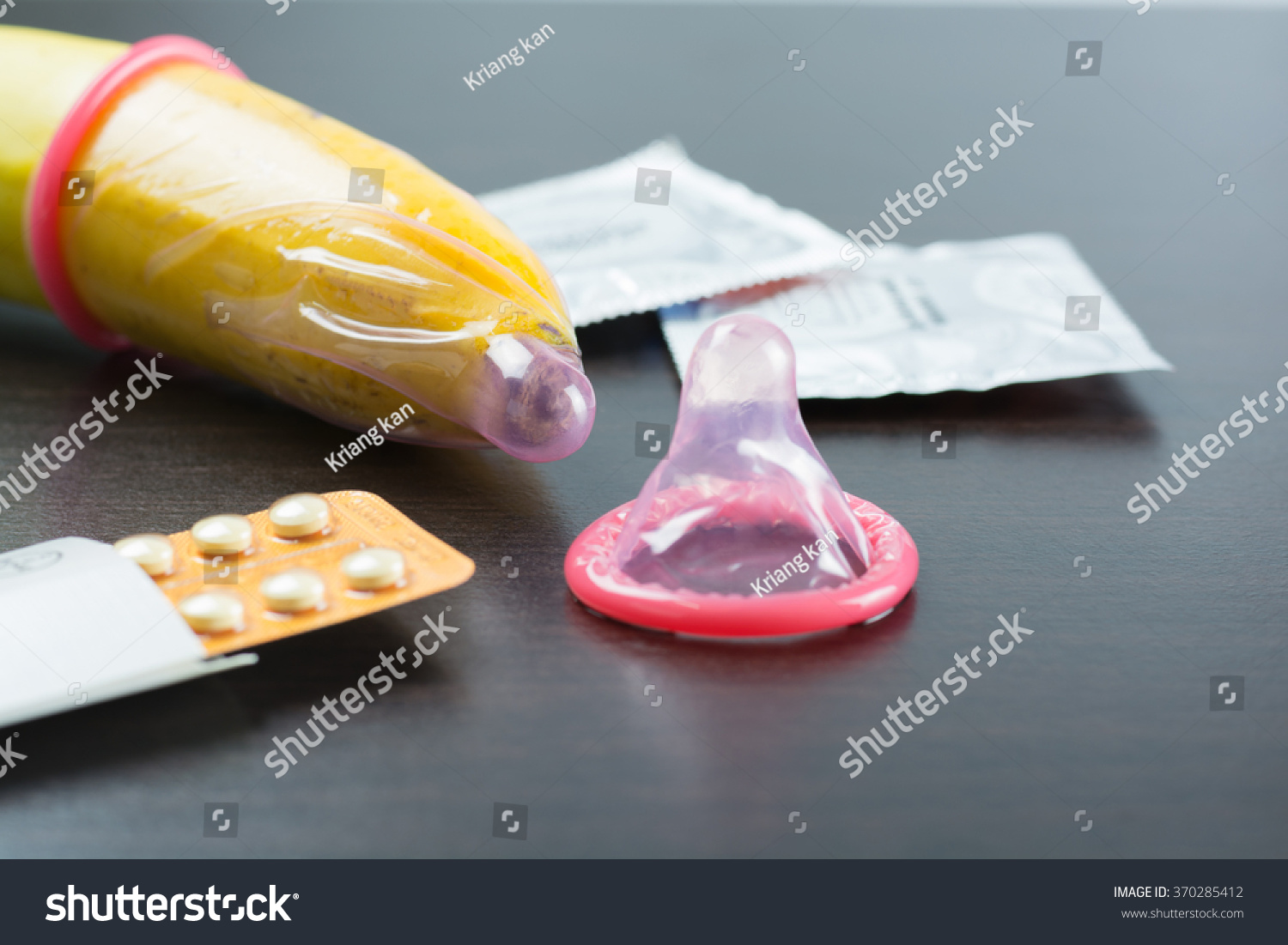 Condom With Banana And Contraception On Wood Background Save Sex And