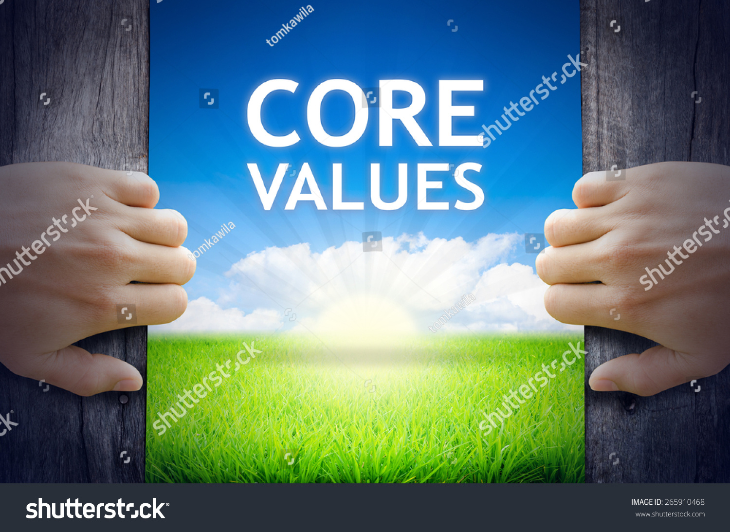 Core Values Hands opening a wooden door then found a texts floating among new world as green grass field Blue sky and the Sunrise Core Values Hands opening a wooden door then found a texts floating among new world as green grass field Blue sky and the Sunrise
