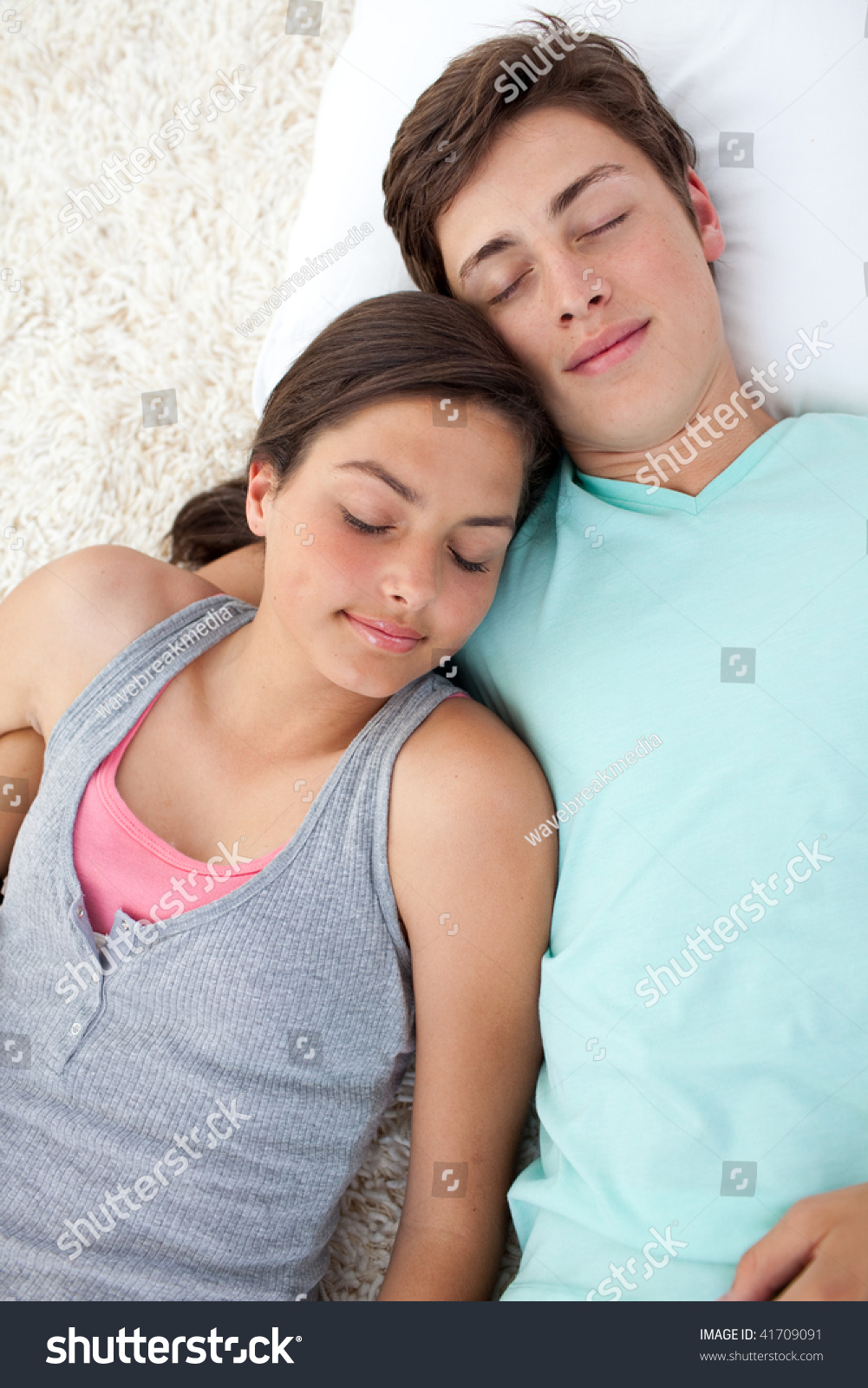 Couple Of Teenagers Sleeping On The Floor Together Stock Photo 41709091 ...