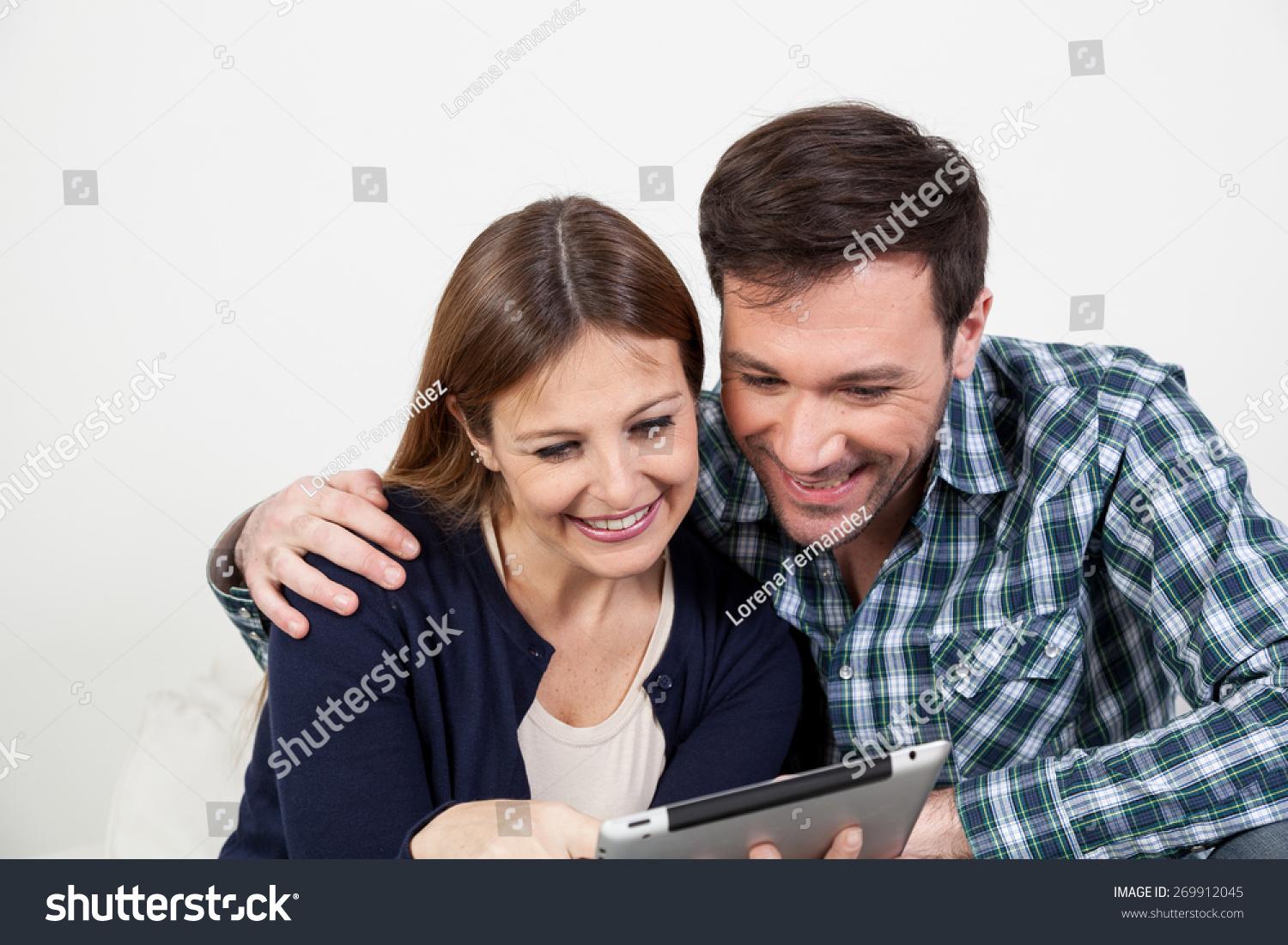 couple using the ipad couple using the ipad