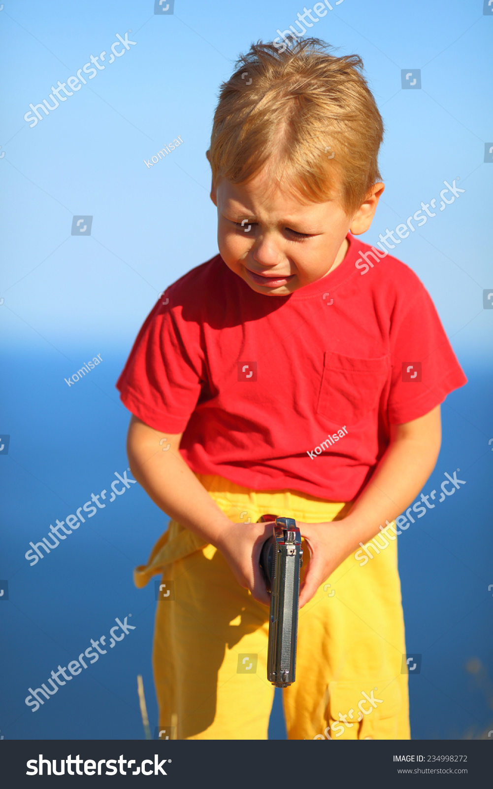 Crying Boy Gun On Coast Stock Photo 234998272 Shutterstock