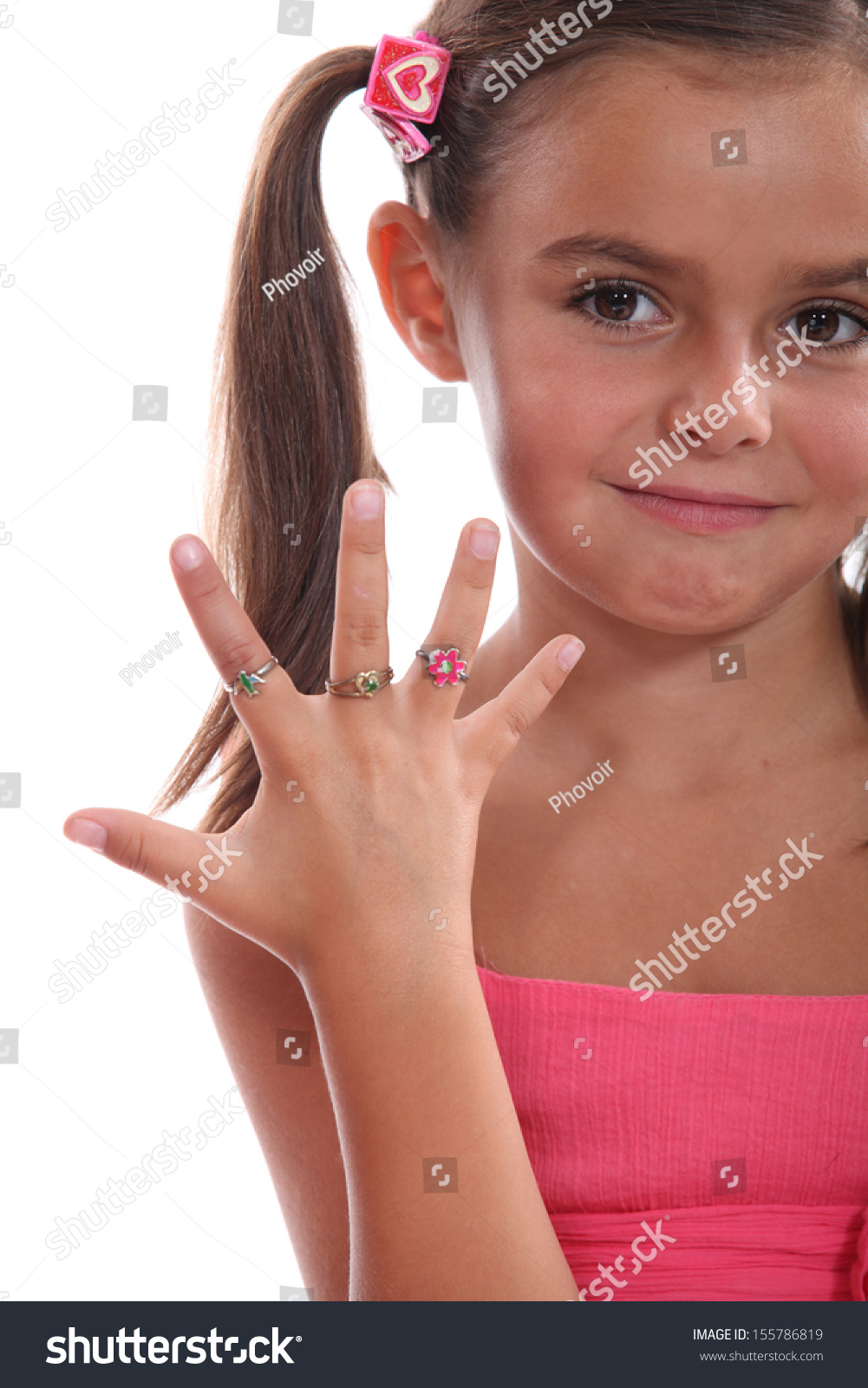 Cute Little Girl Showing The Rings On Her Hand Stock Photo 155786819