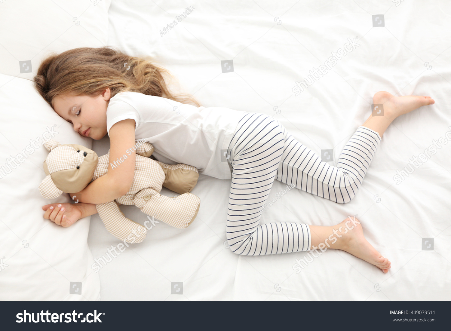 cute baby sleeping with teddy