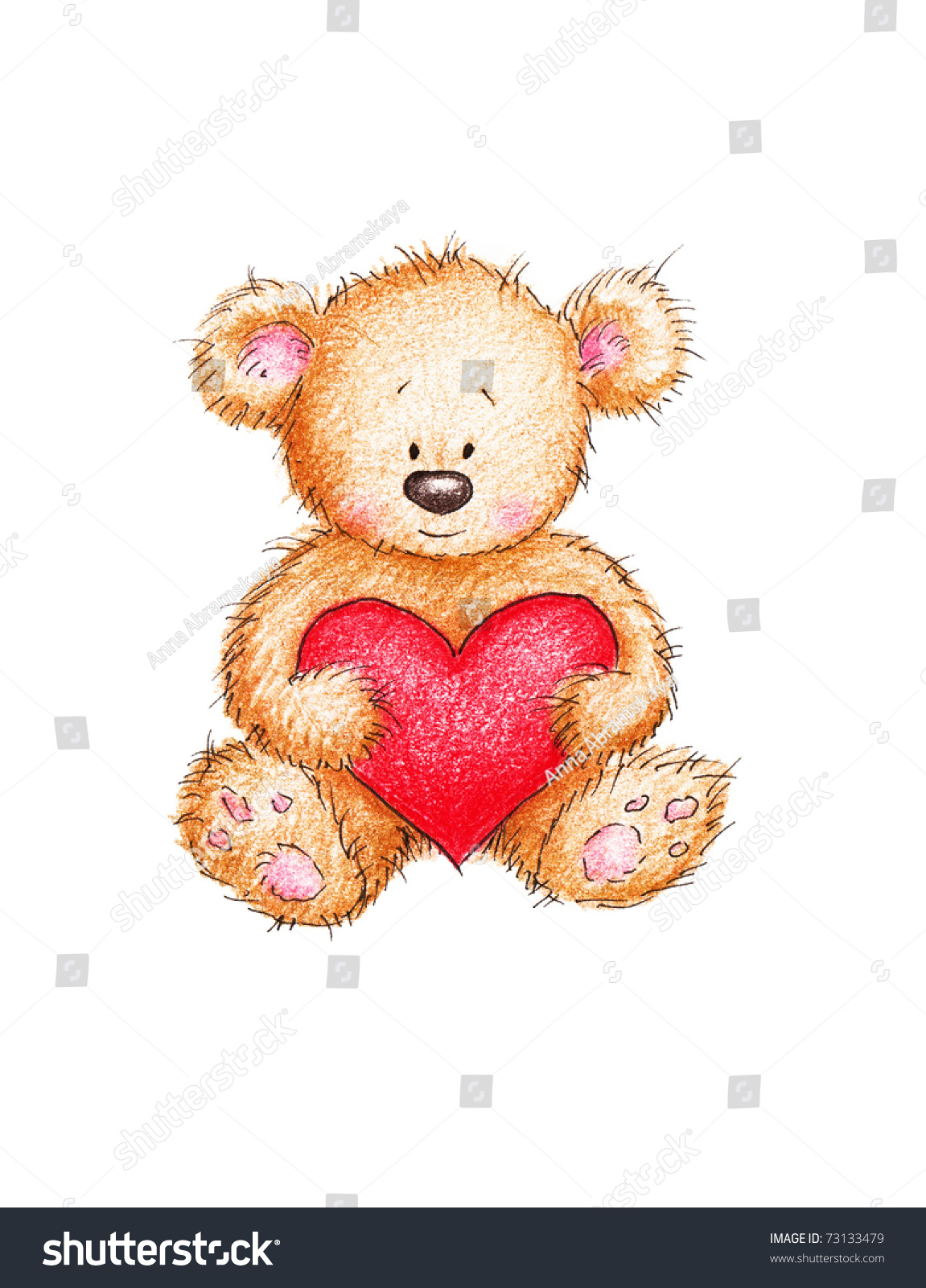 small teddy bear holding heart