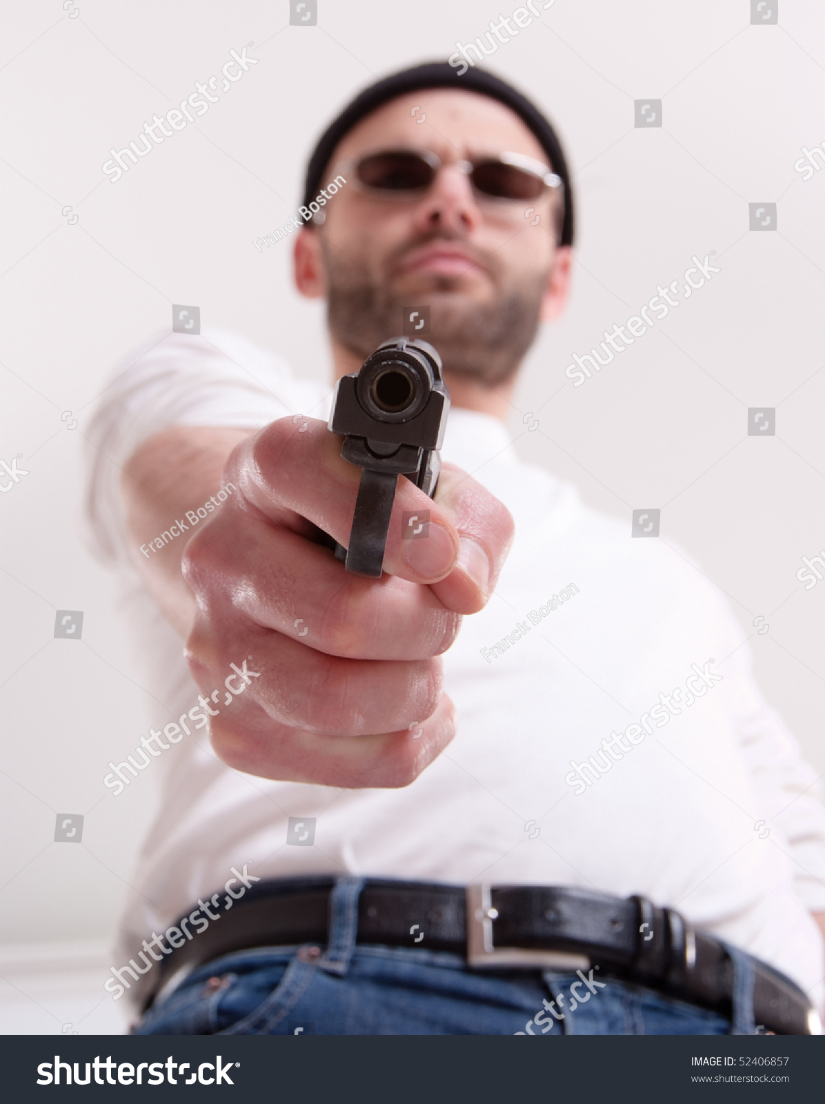 Dangerous Looking Man Holding Gun Aiming Stock Photo 52406857 - Shutterstock1196 x 1600