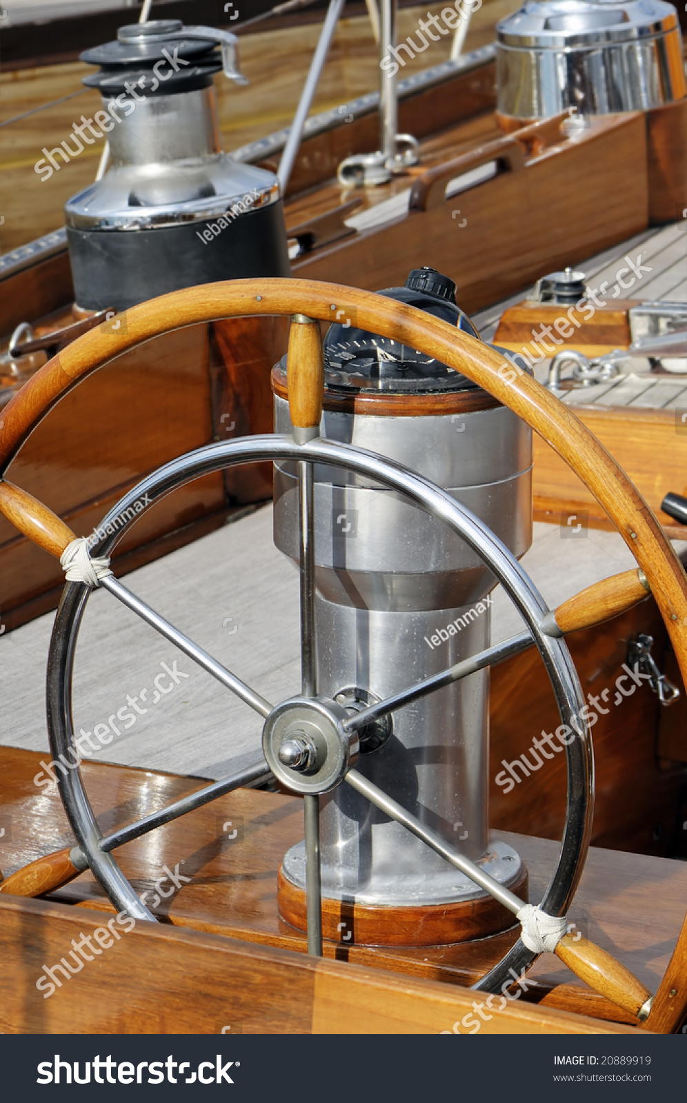 old boat navigation tools detail of an old fashioned boat deck with rudder compass old boat navigation tools detail of an old fashioned boat deck with rudder compass