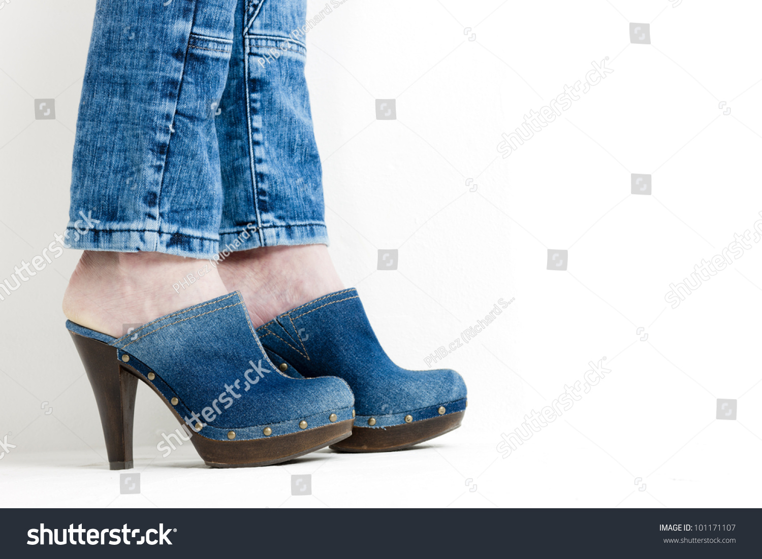 Detail Of Woman Wearing Denim Clogs Stock Photo 101171107 : Shutterstock