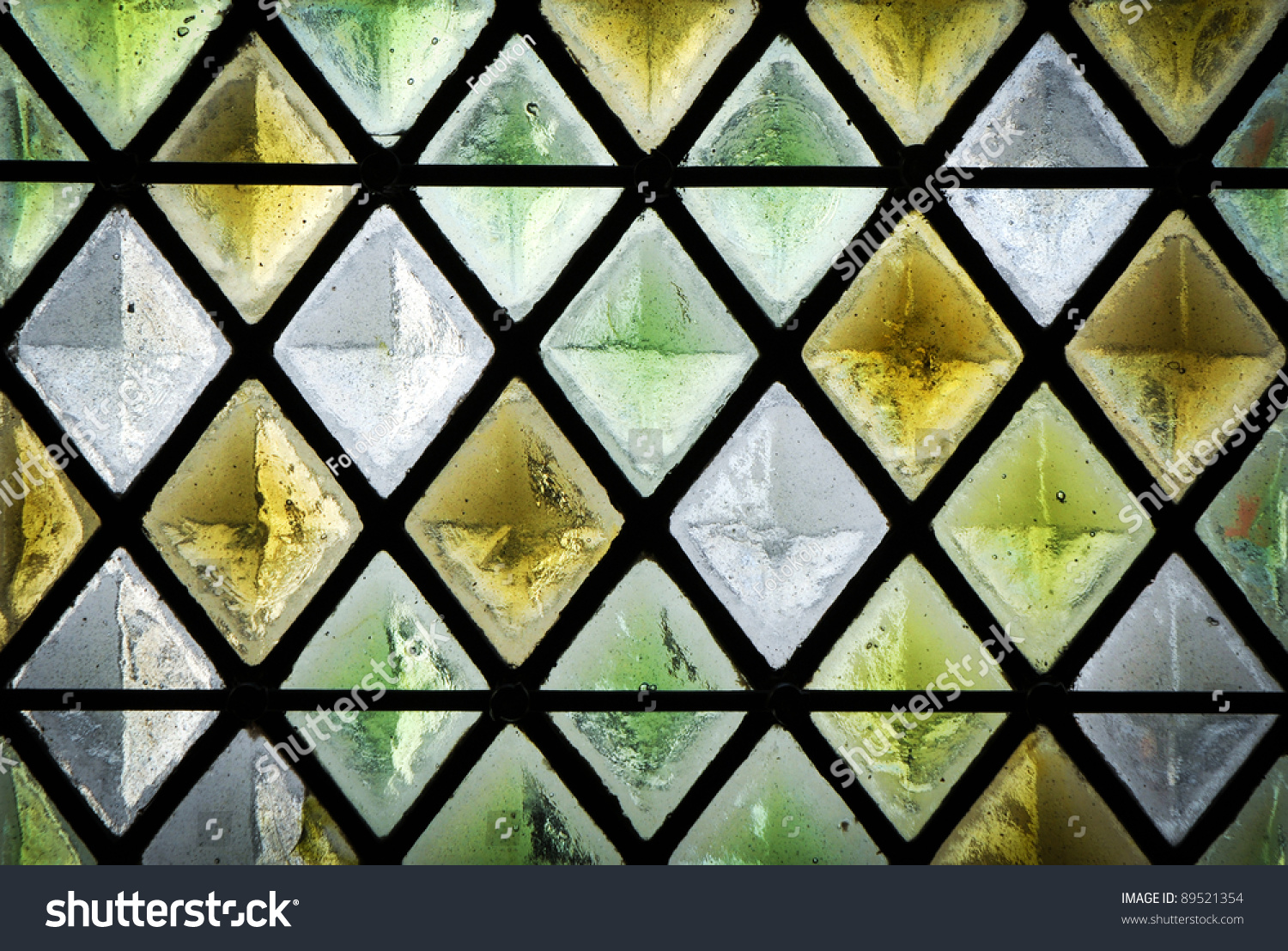 Diamond Shaped Pattern Of A Stained Glass Window Stock Photo 89521354