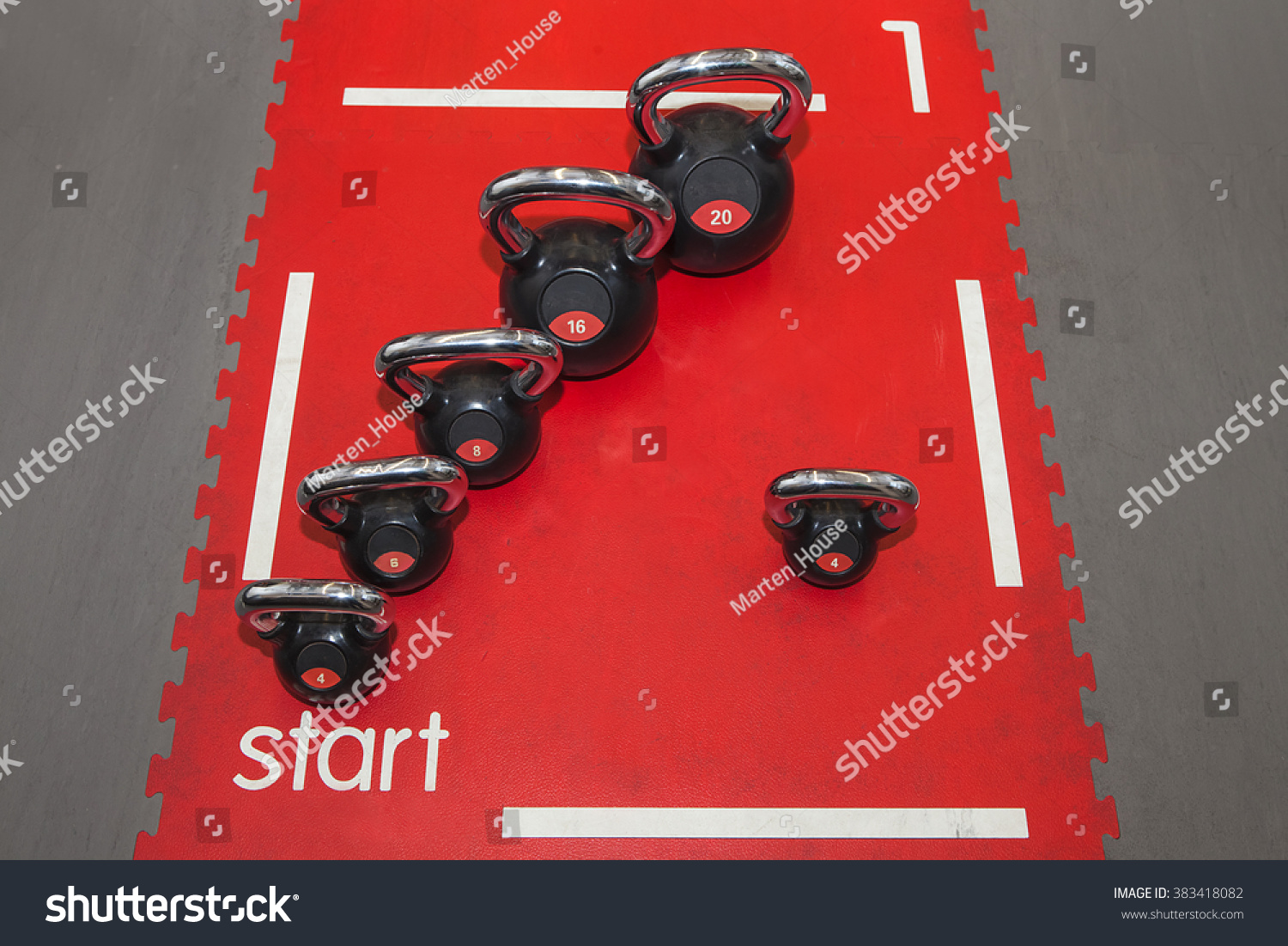 Different Sizes Kettlebells Weights Lying On Stock Photo