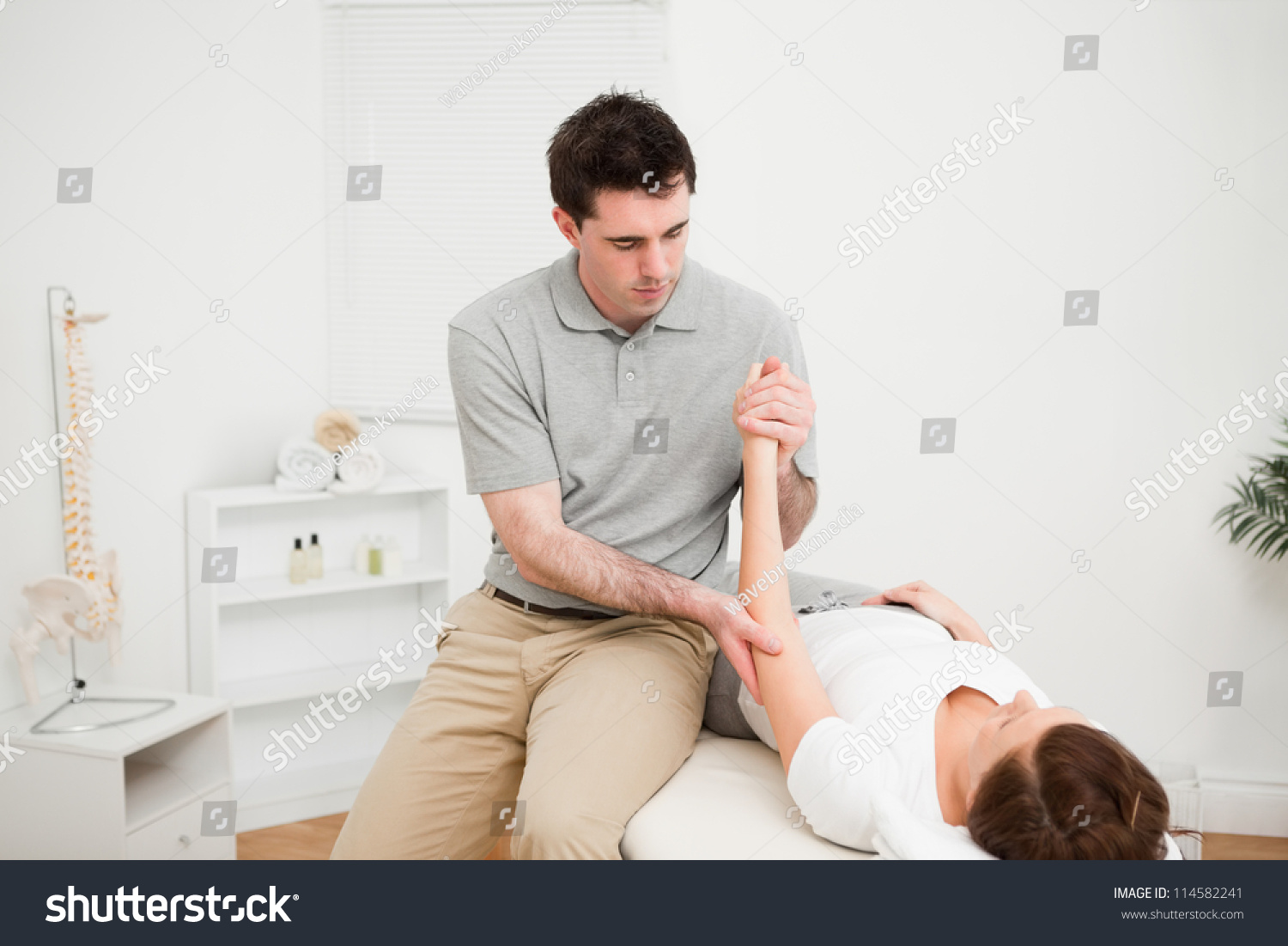 Doctor Examining Arm His Patient While Stock Photo 114582241 - Shutterstock