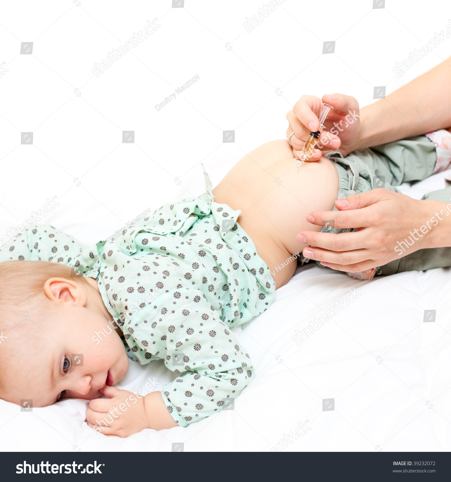 Doctor Giving A Child An Intramuscular Injection Shallow Dof Stock