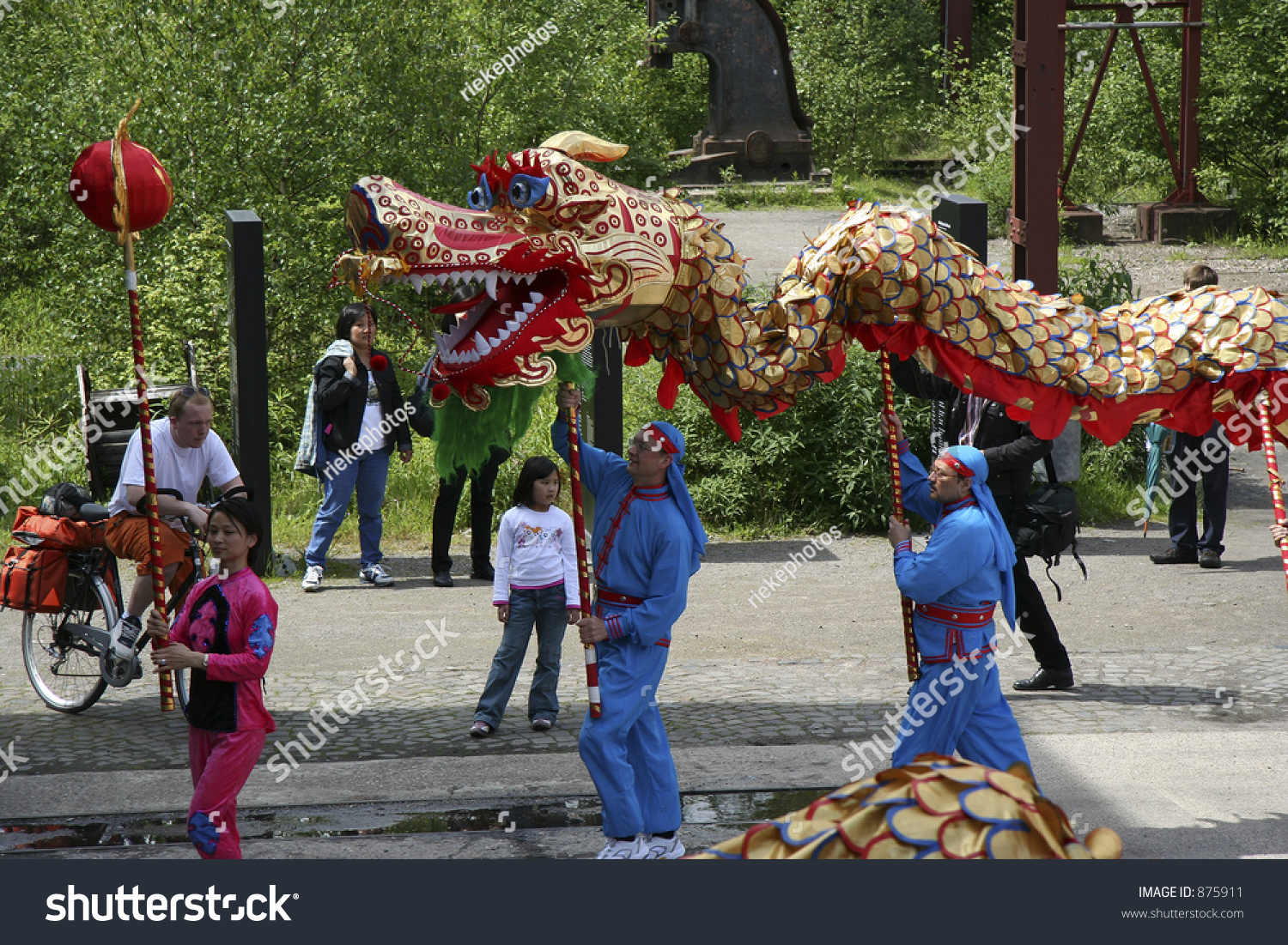 Dragon-Dance - Three Performers And The Dragon - Chinese New Year Stock