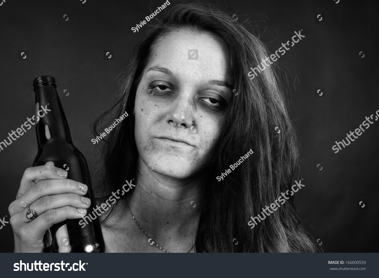 Dramatic Black And White Portrait Of A Young Woman Addict With Beer