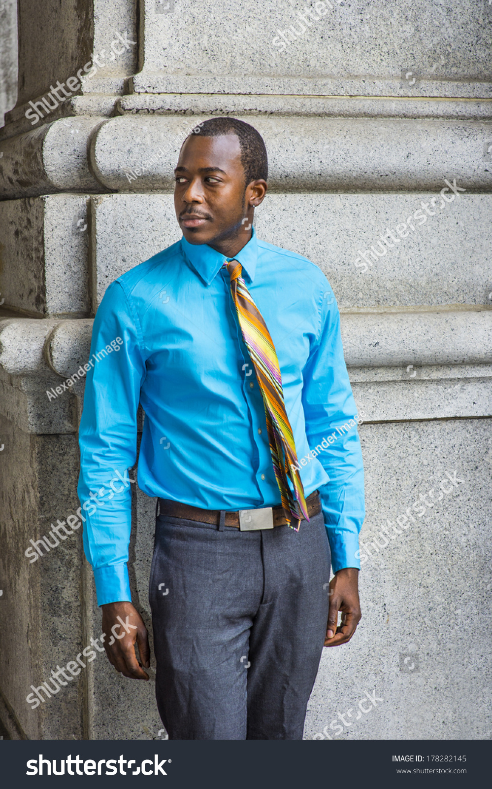 grey pants light blue shirt