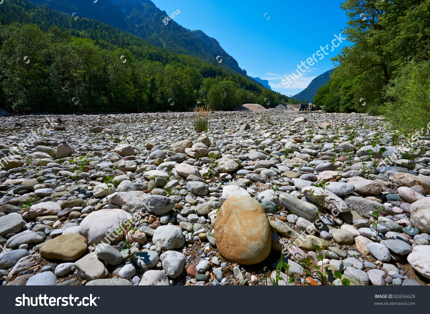 stock-photo-dry-river-bed-in-the-bavarian-alps-germany-82656628.jpg