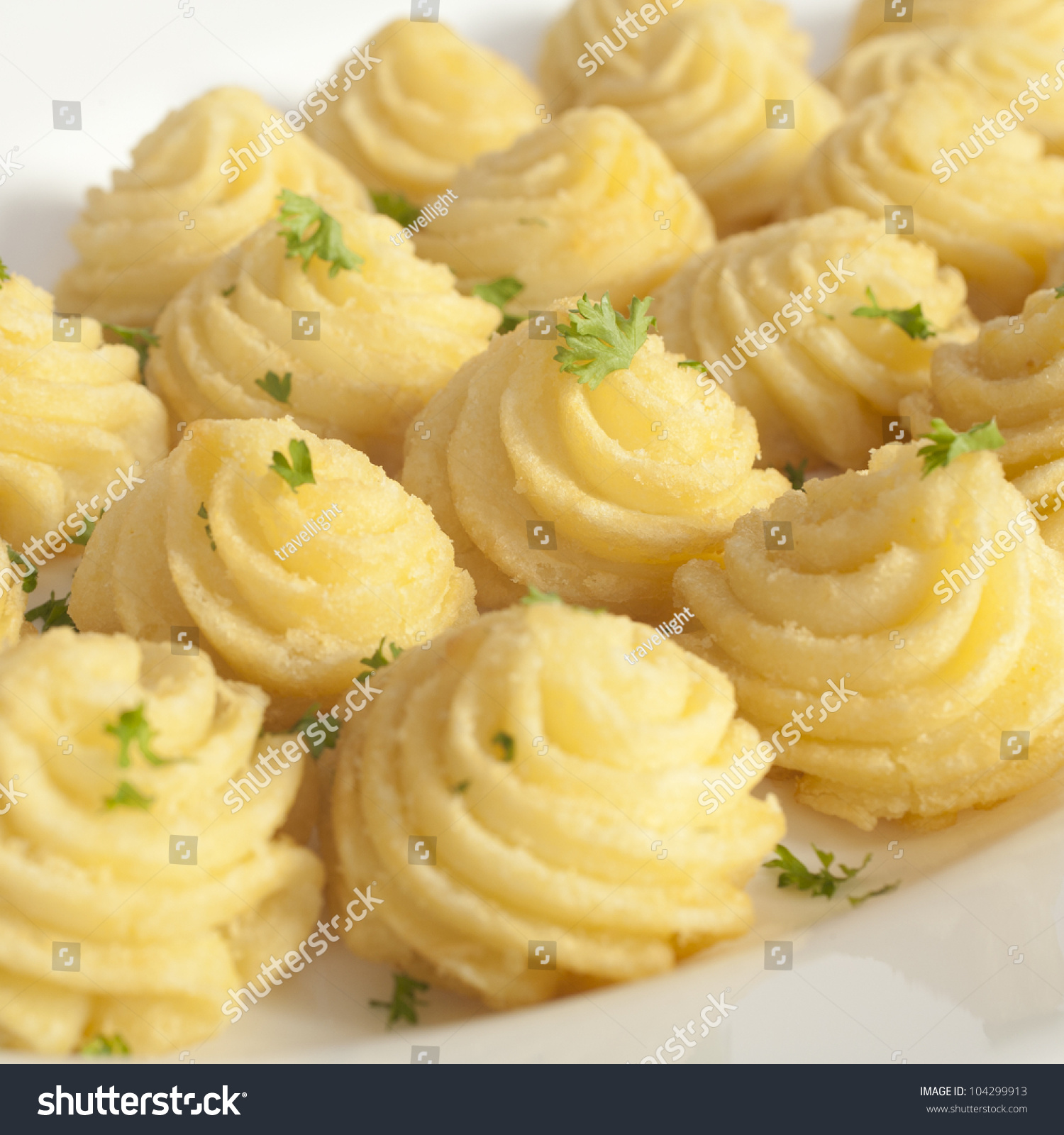 Duchess Potatoes, Mashed Potato Mixed With Egg, Piped Into Swirls And Baked In The Oven. Stock