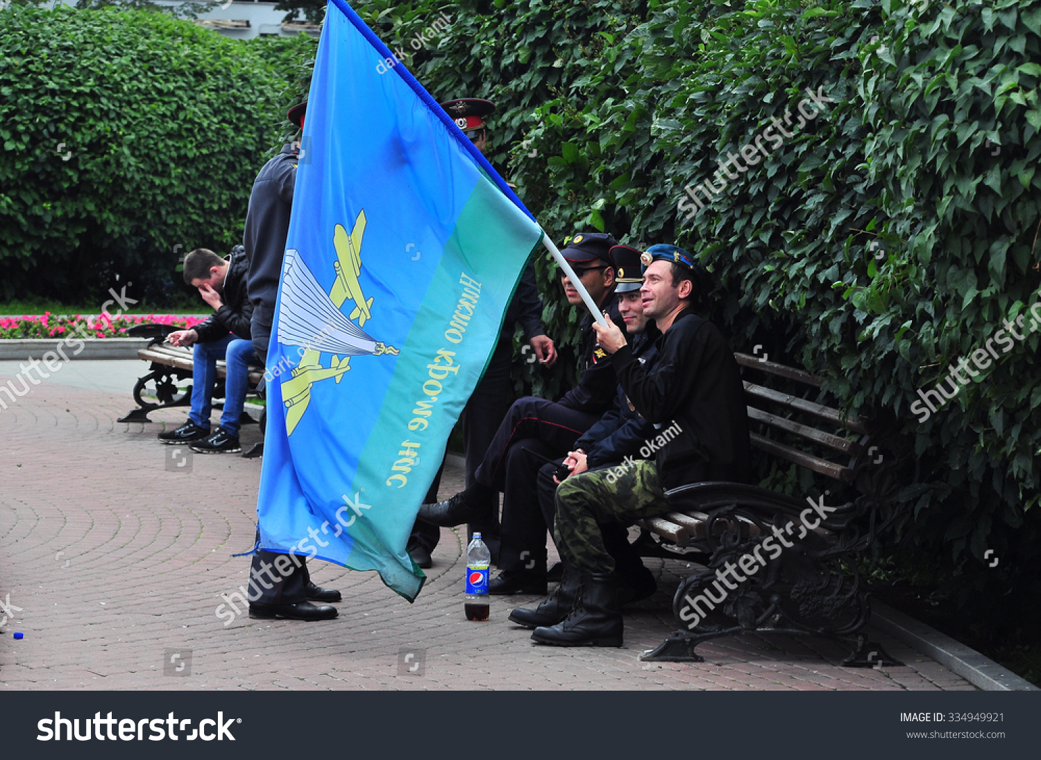 Ekaterinburg AUGUST 2 Russian paratroopers demobilized with a flag walking during the Feast of Russian Air Assault Troops on August 2 2014 in Ekaterinburg Ekaterinburg AUGUST 2 Russian paratroopers demobilized with a flag walking during the Feast of Russian Air Assault Troops on August 2 2014 in Ekaterinburg