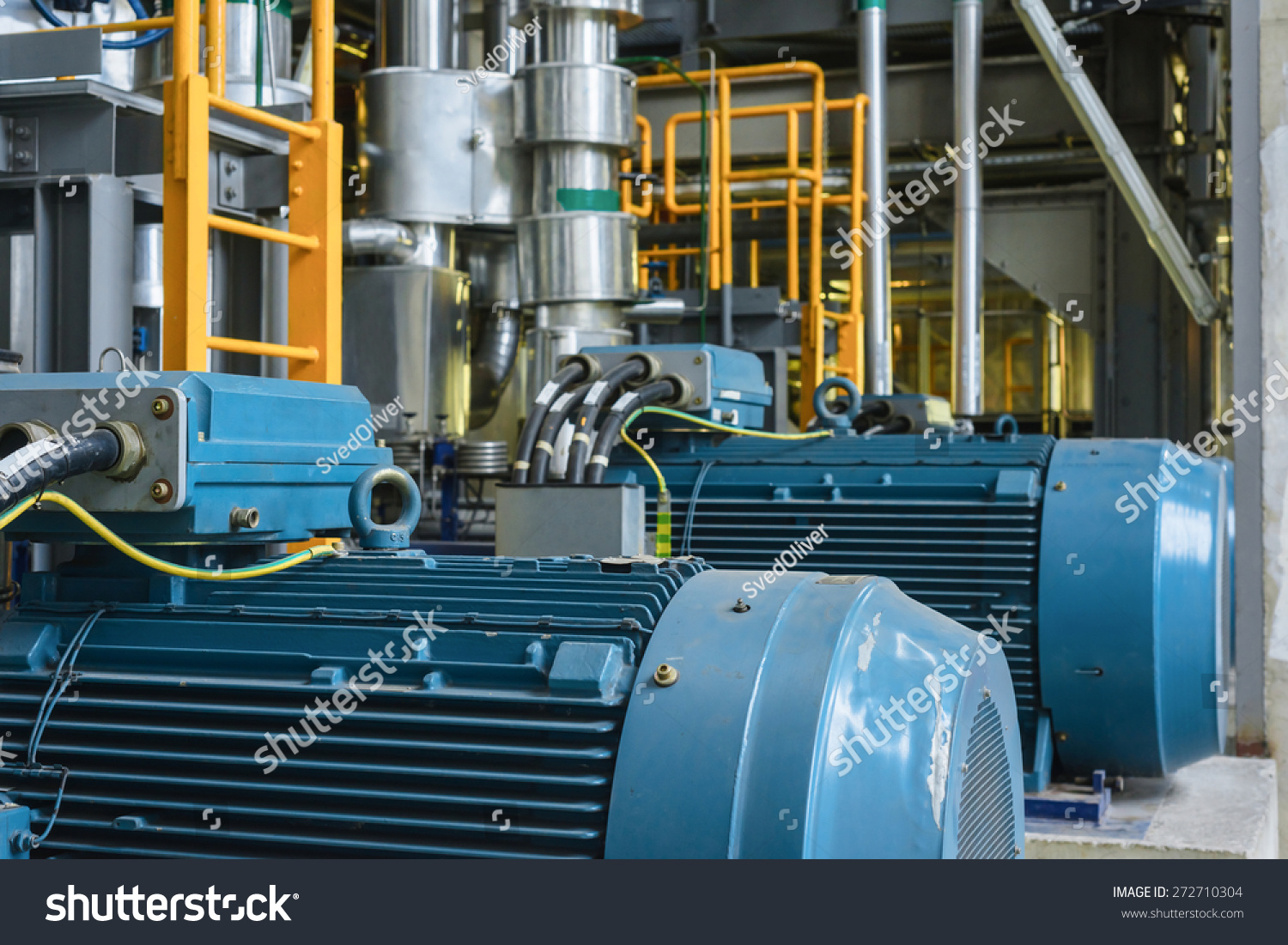 Electric Industrial generator inside power plant closeup Electric Industrial generator inside power plant closeup