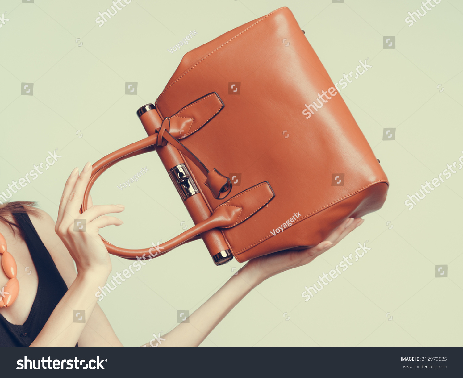 Elegant Fashionable Woman With Leather Handbag. Stylish Girl Holding